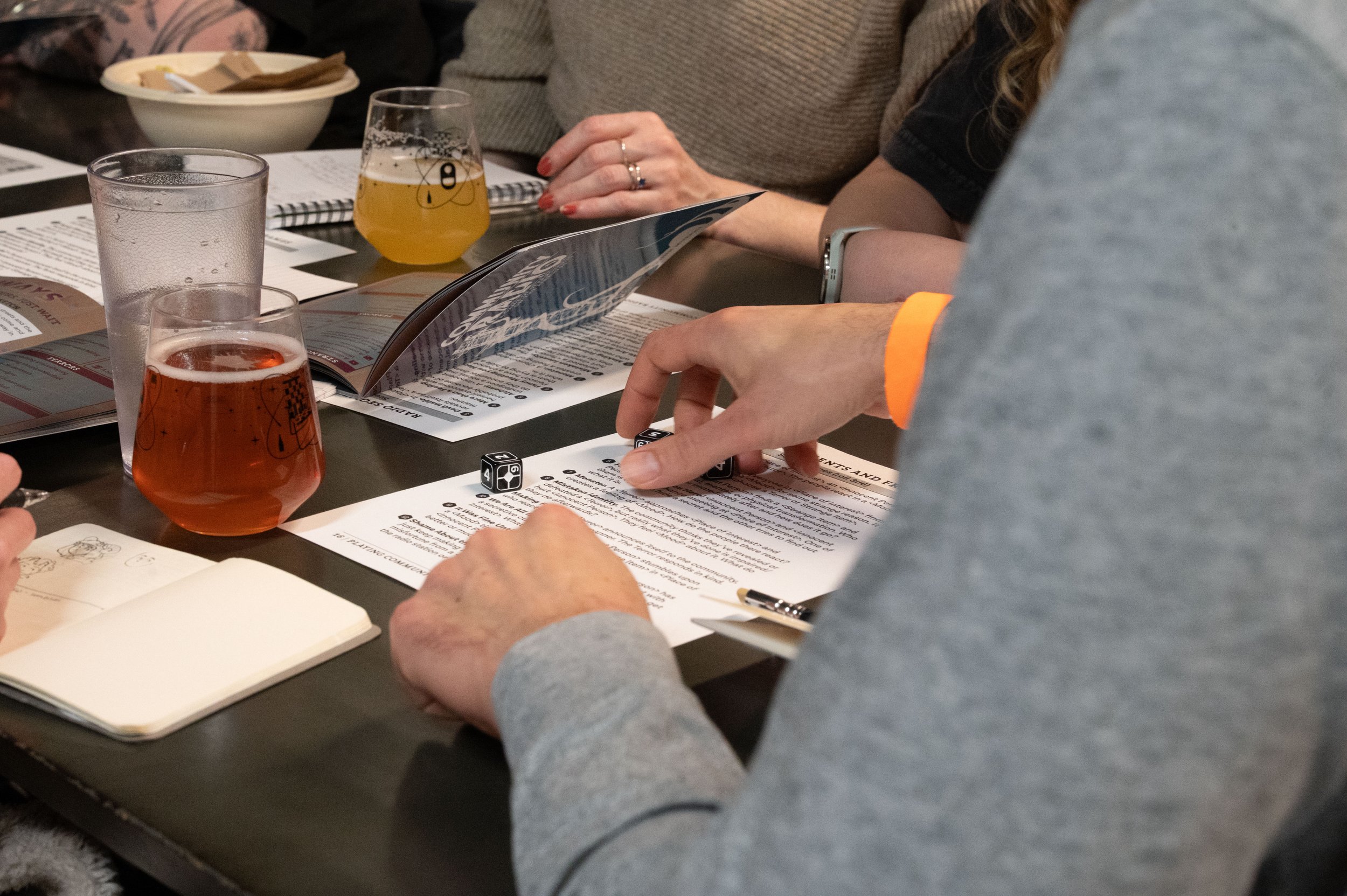 Attendees play Community Radio, a game designed and lead by Quinn Murphy, local Somerville game designer since 2009.