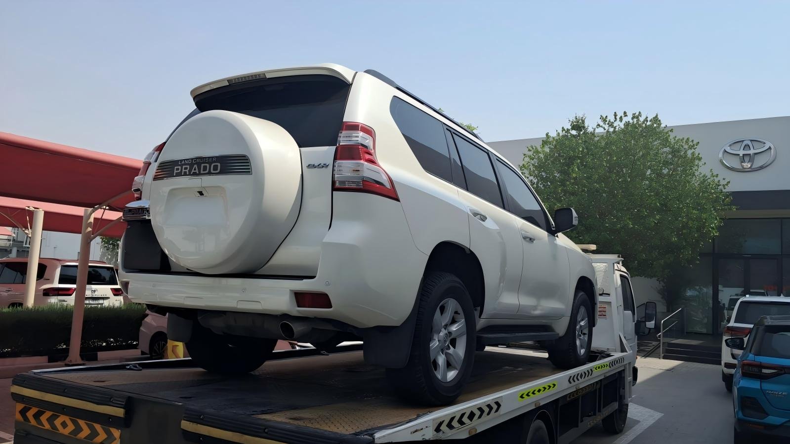 Flatbed Recovery Truck Dubai — Toyota Land Cruiser Prado, Deira to Sharjah