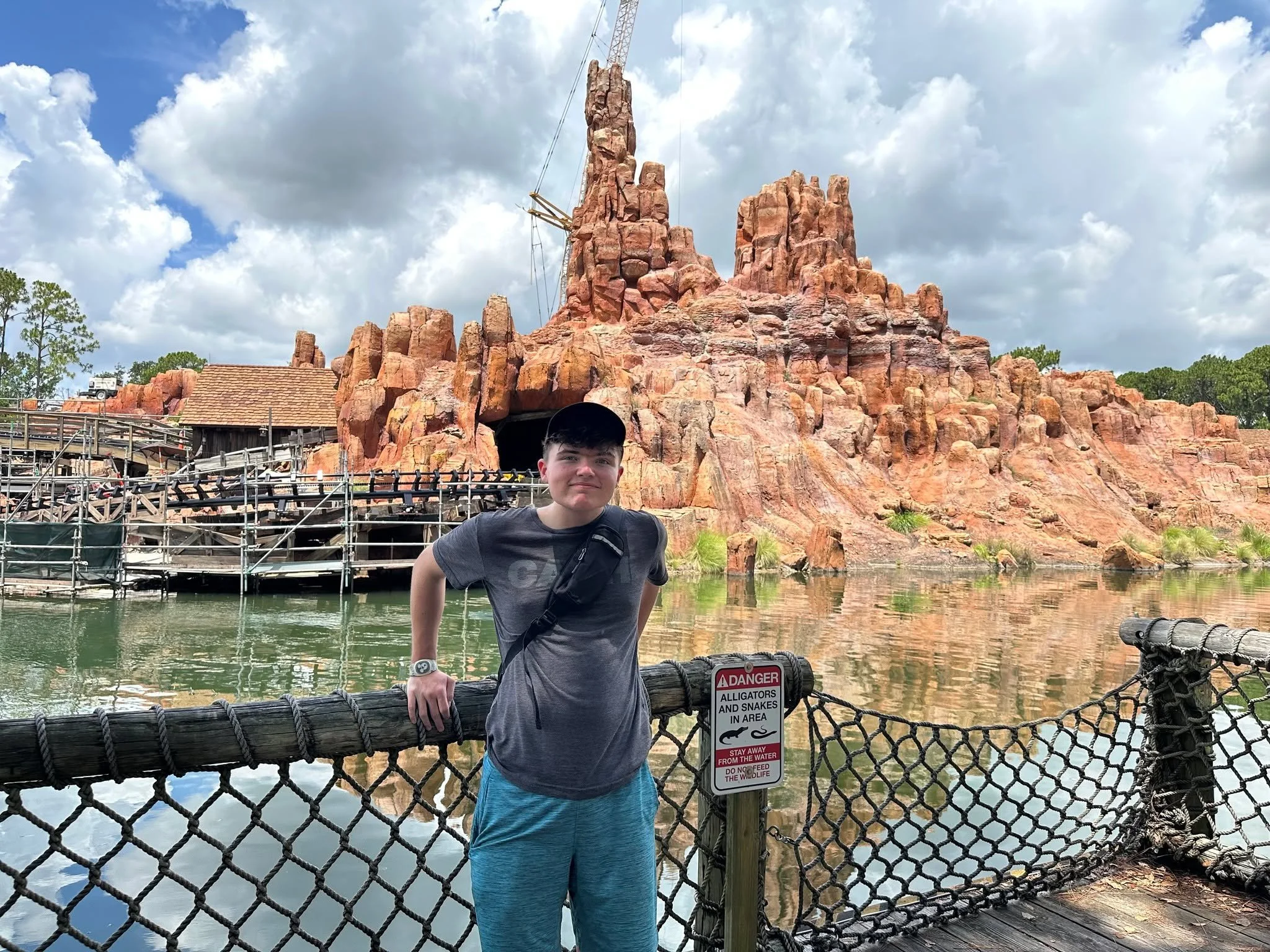 Had to snap this iconic photo of Cash with Big Thunder Mountain from Tom Sawyer's Island, just before the island's permanent closure to make way for Piston Peak National Park.

Big Thunder Mountain was the first &quot;real&quot; roller coaster Cash f