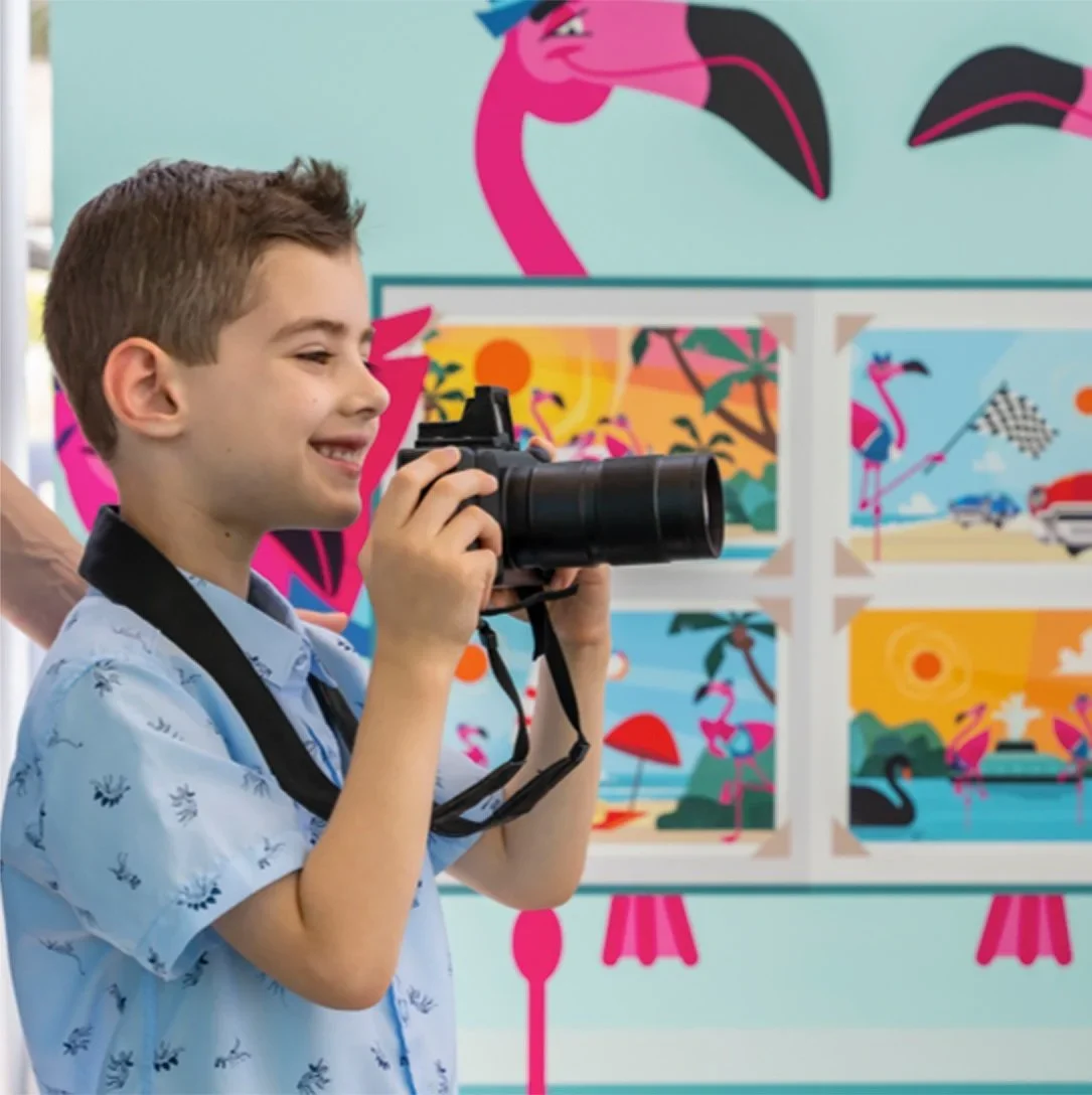 kid camera icon park Florida road trip environmental graphic
