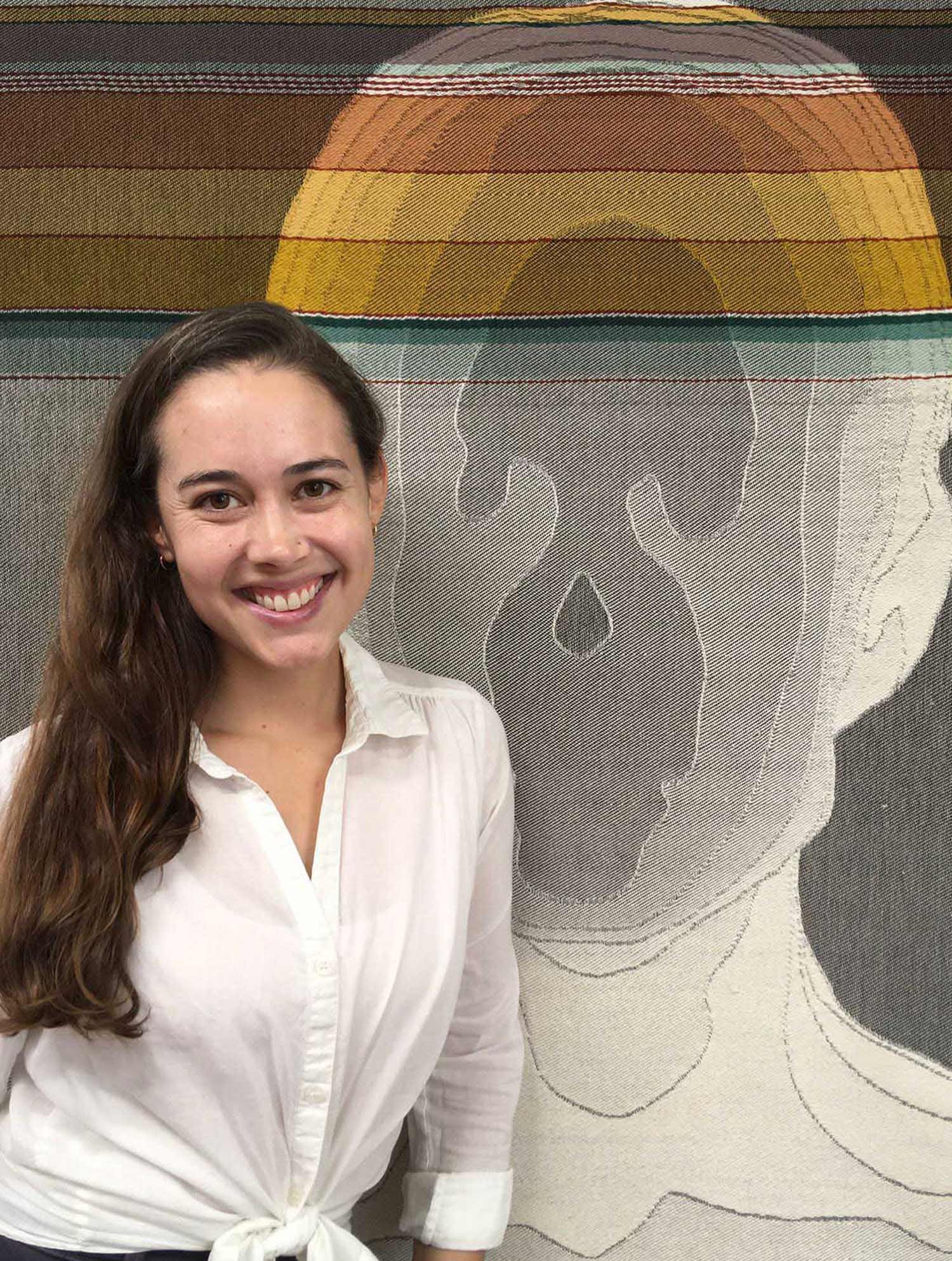 Jaya Griscom in front of Woven Geography, 2021, handwoven cotton jacquard, textile at Praxis Residency