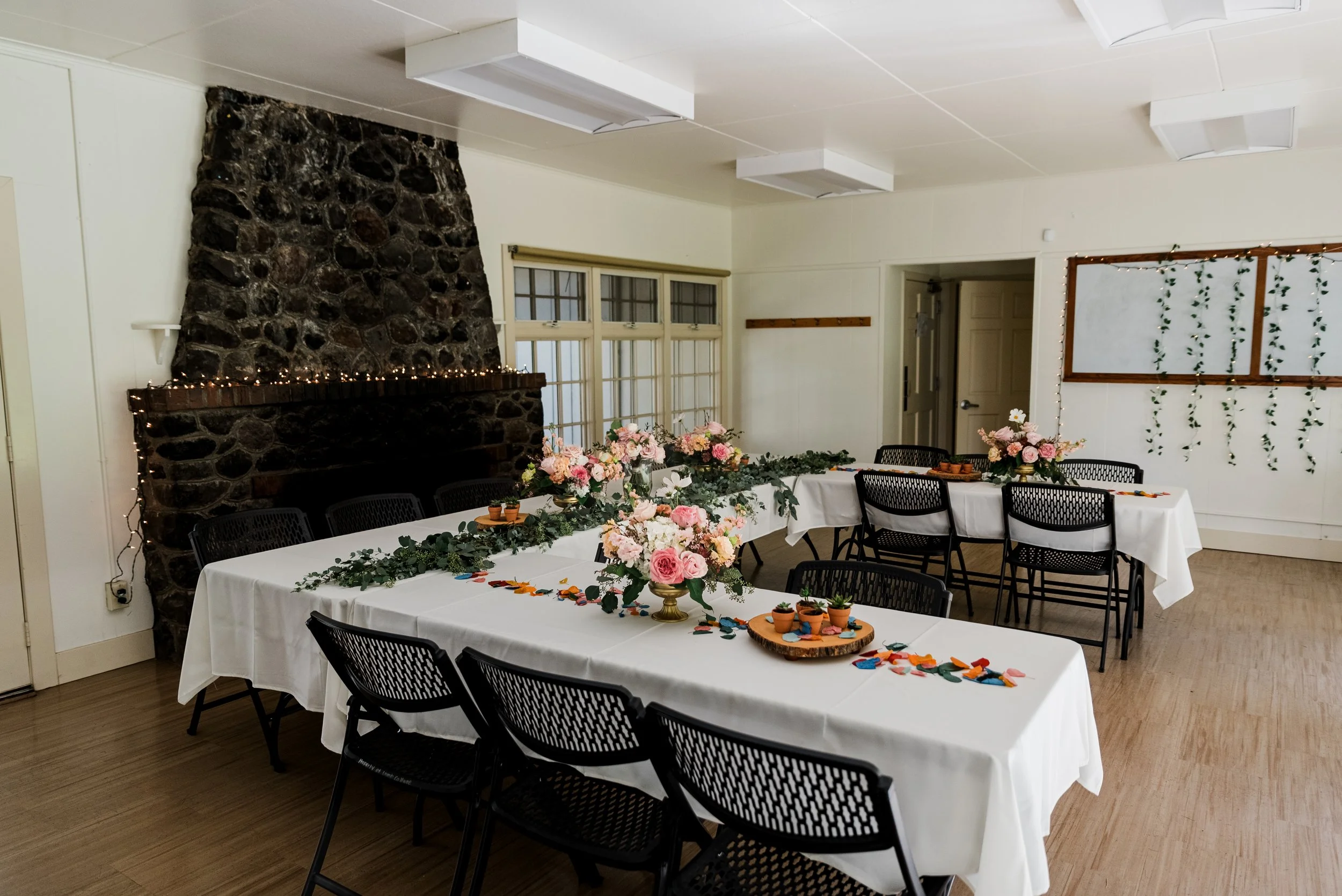 An intimate reception inside Lamb Cottage at a public park in Eugene, Oregon