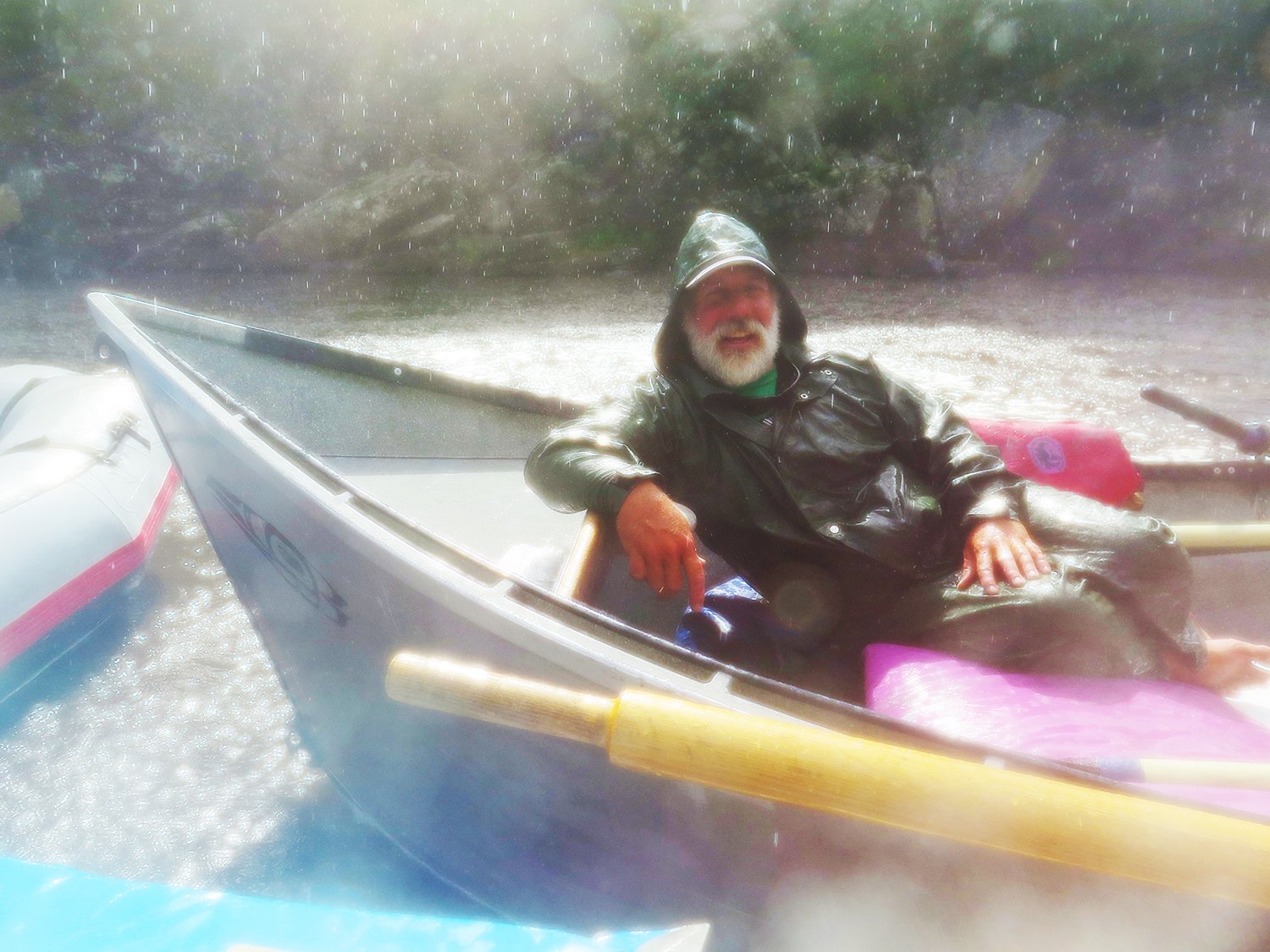 roy akins reclines in his drift boat.jpg