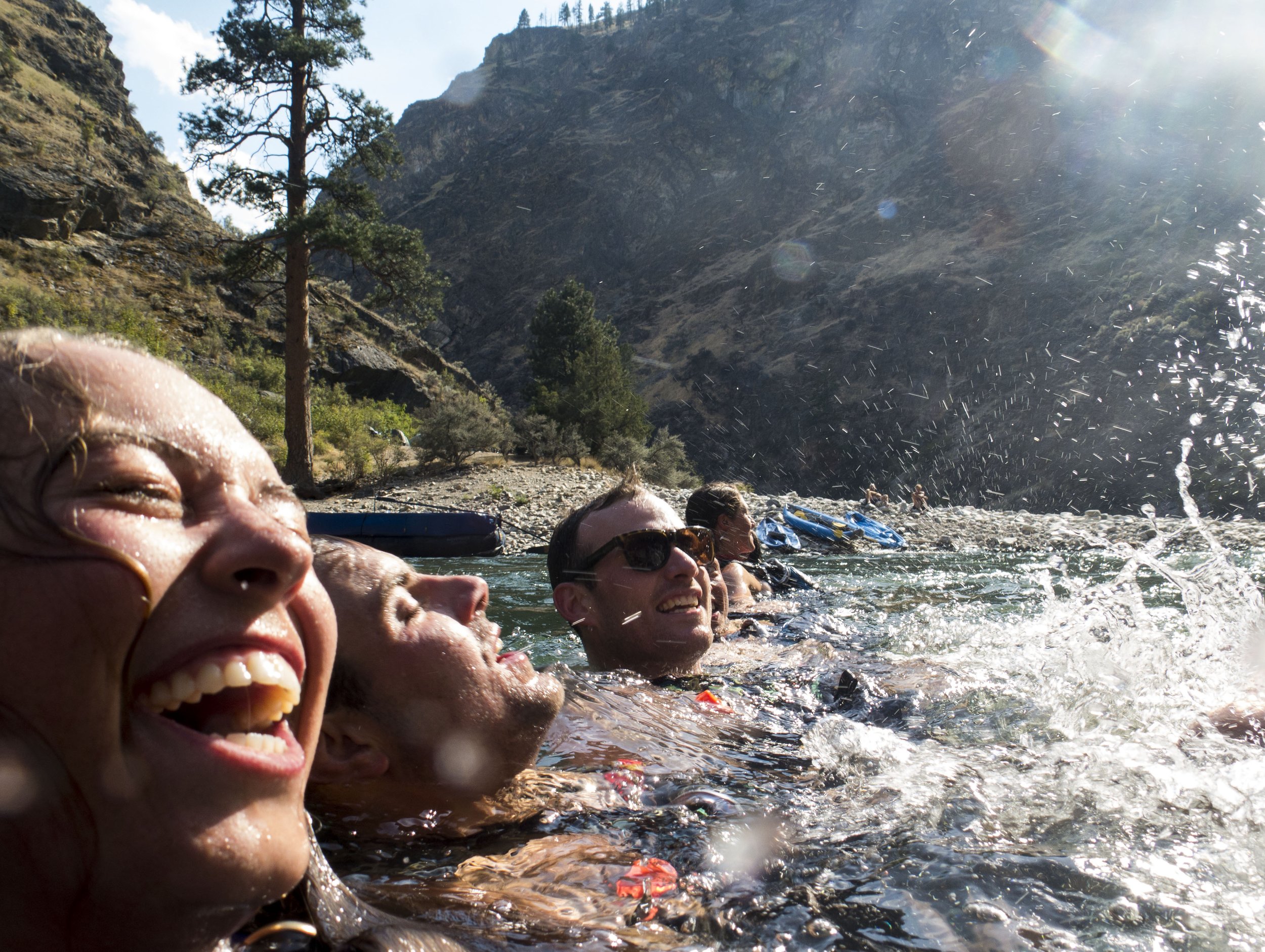 karoline woodhead swims the middle of the salmon river with other guides.jpg