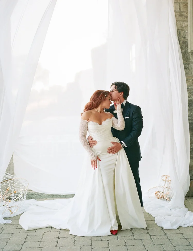Couple portrait in front of wedding ceremony design