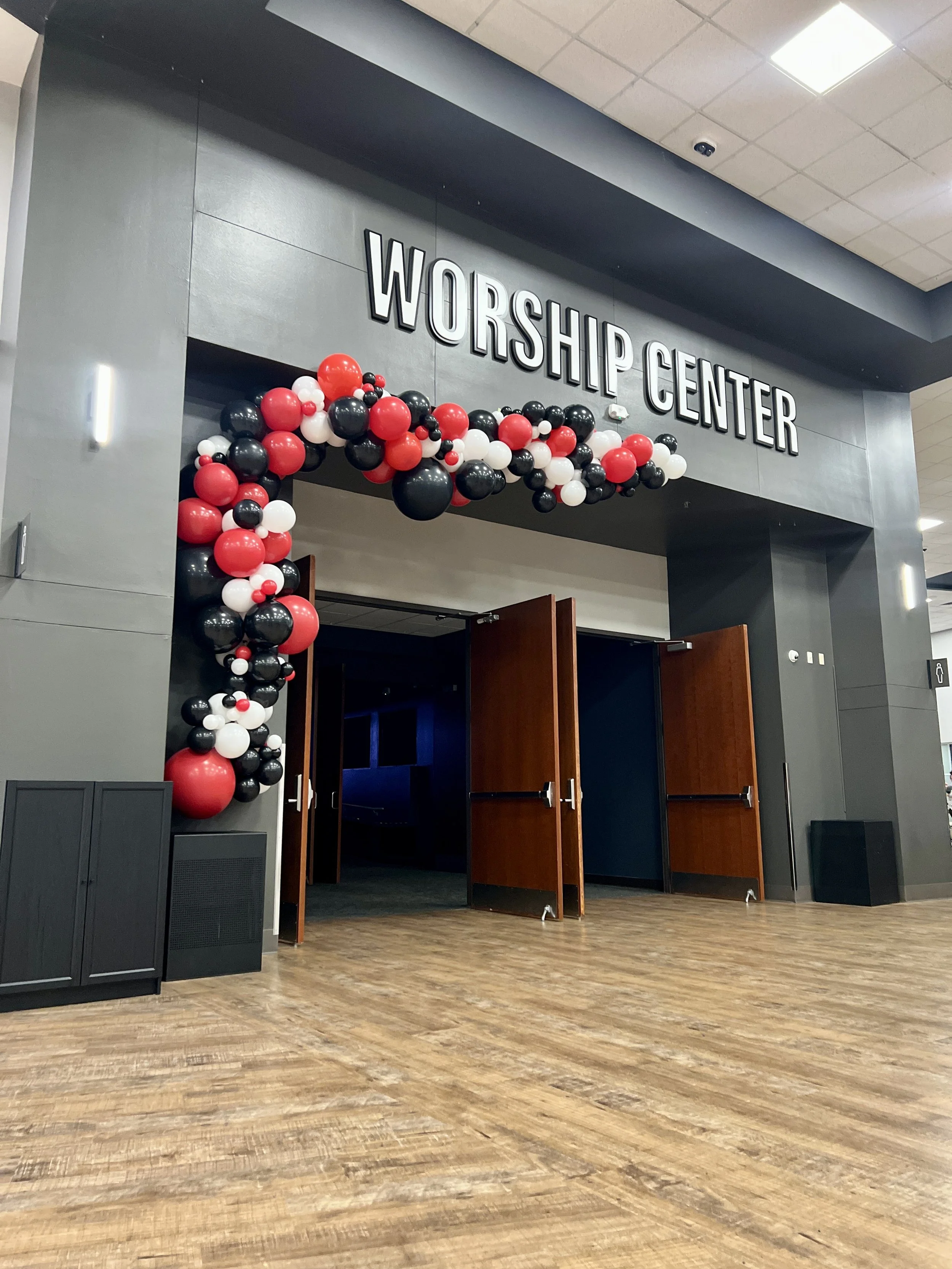 Custom balloon décor for Pastor Ed Newton’s Why Not You? book launch at Community Bible Church featuring a modern balloon installation in San Antonio, Texas.