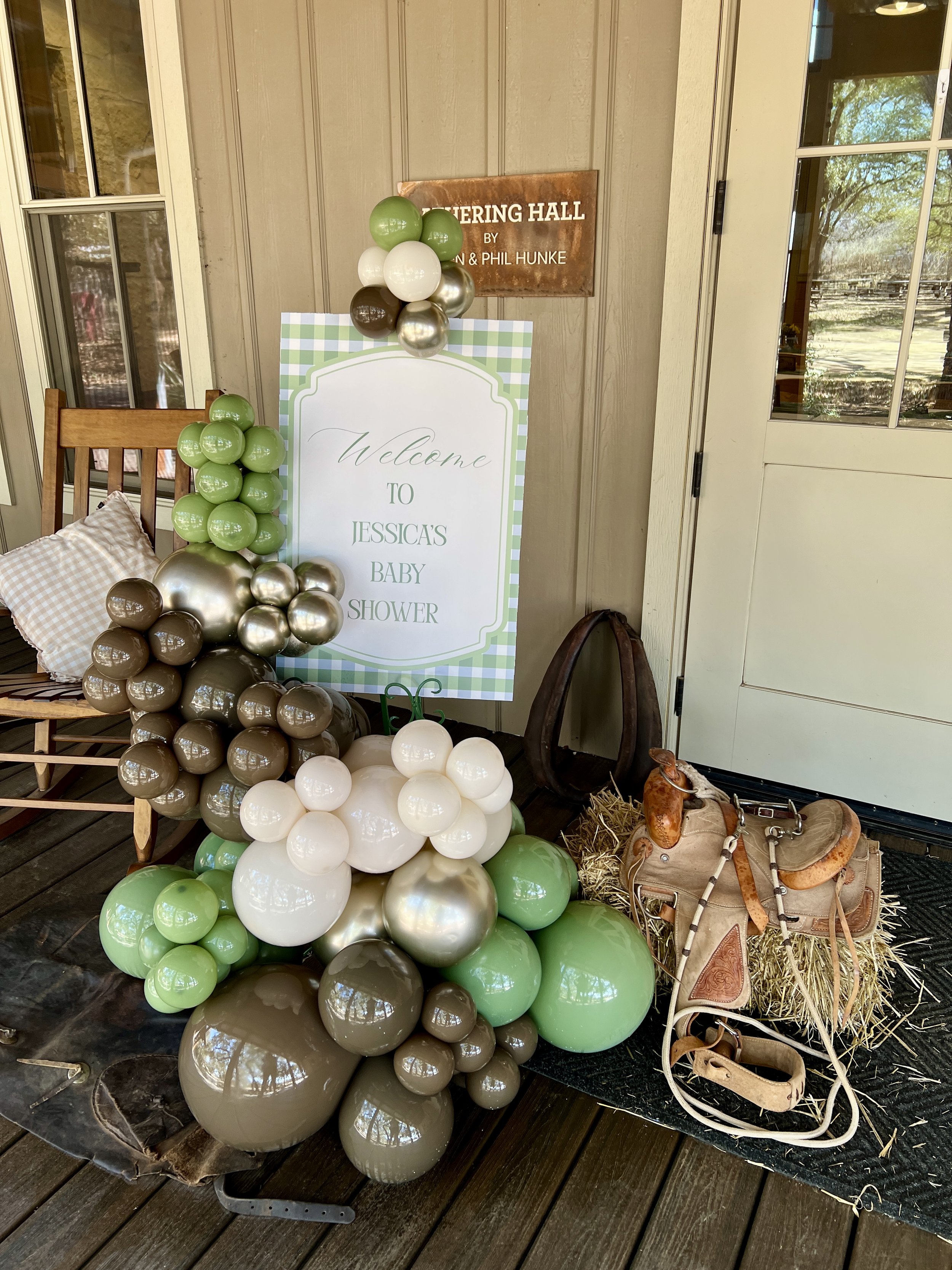 Custom 20 X 30 Welcome sign keepsake. Design by True Celebrations for client. Easel stand rental in custom green color. Luxe balloon garland.  