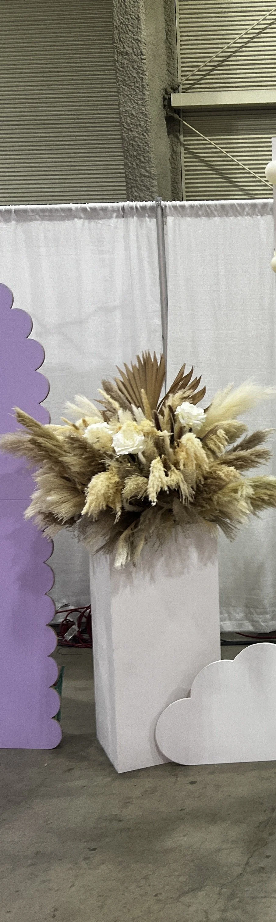 Floral arrangement on Pedestal. 