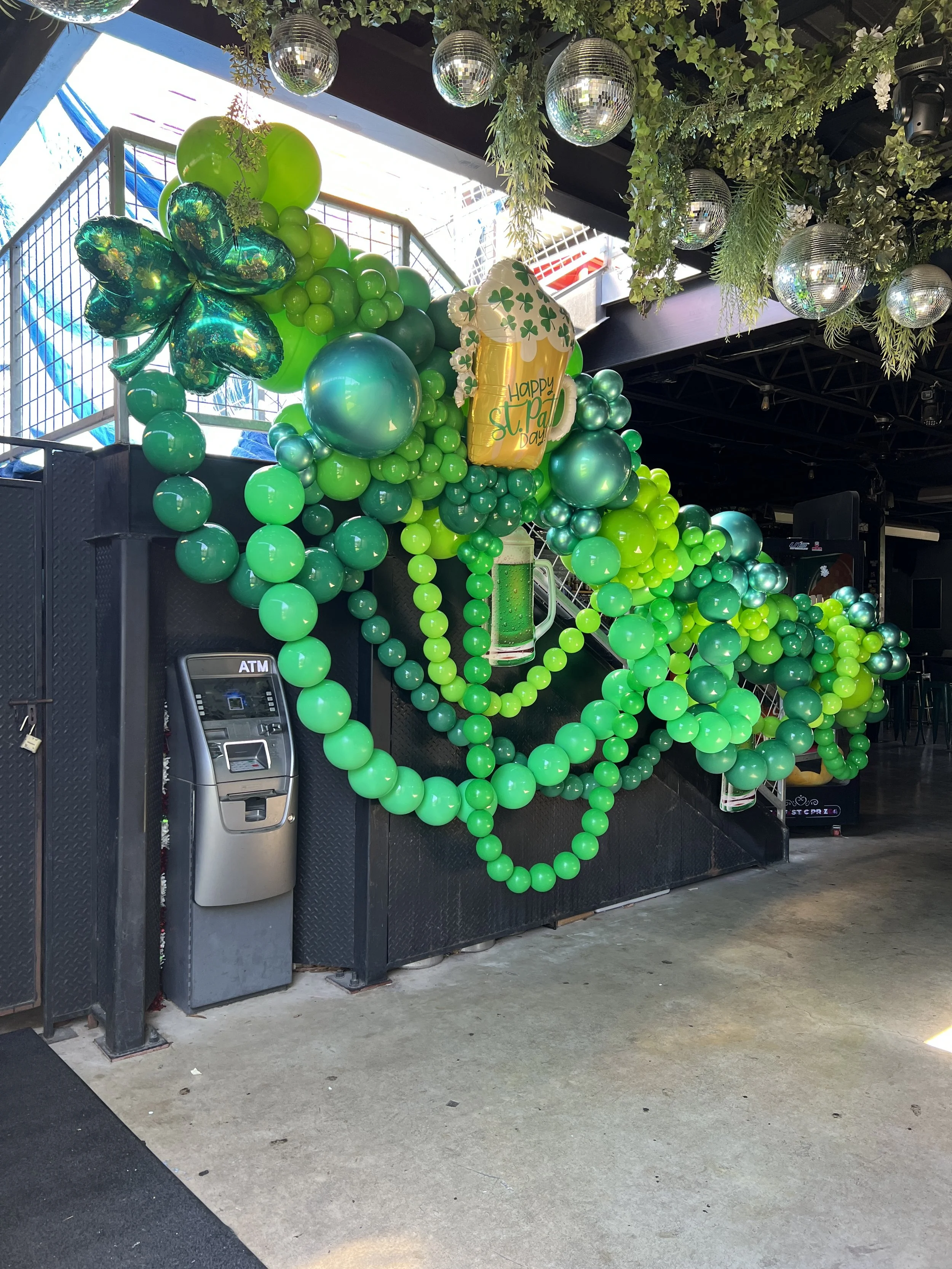 Lucky Duck St Patrick's day balloon decor for Bar way staircase. 