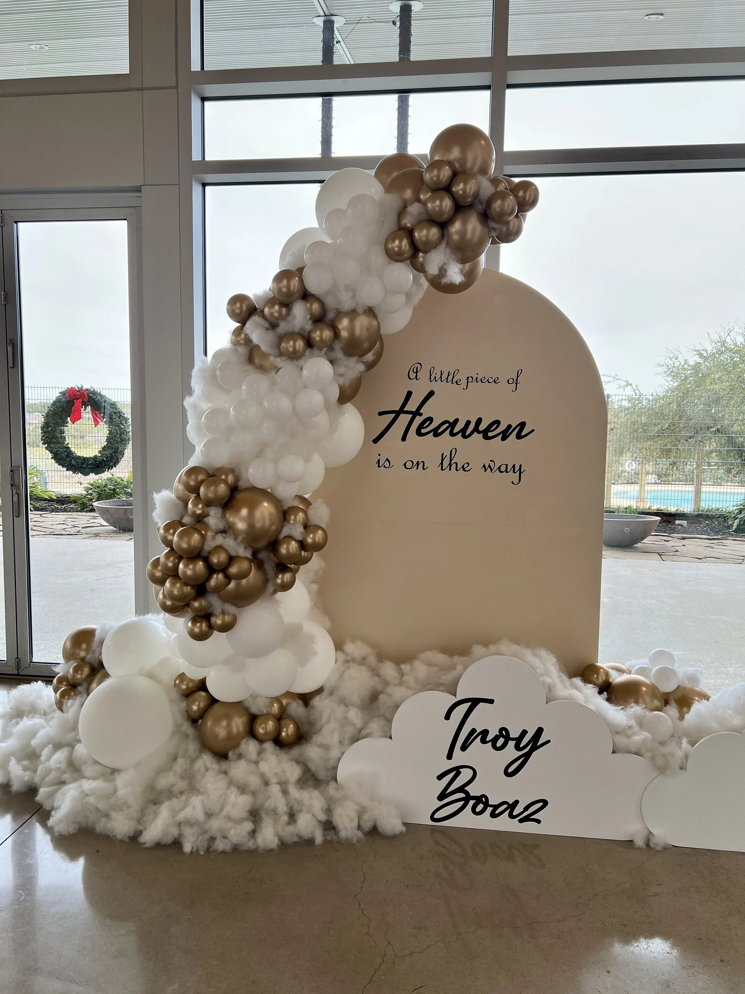 Heavenly Baby Shower setup with custom wood clouds and cloud fluff. Luxe textures and dimensions. 