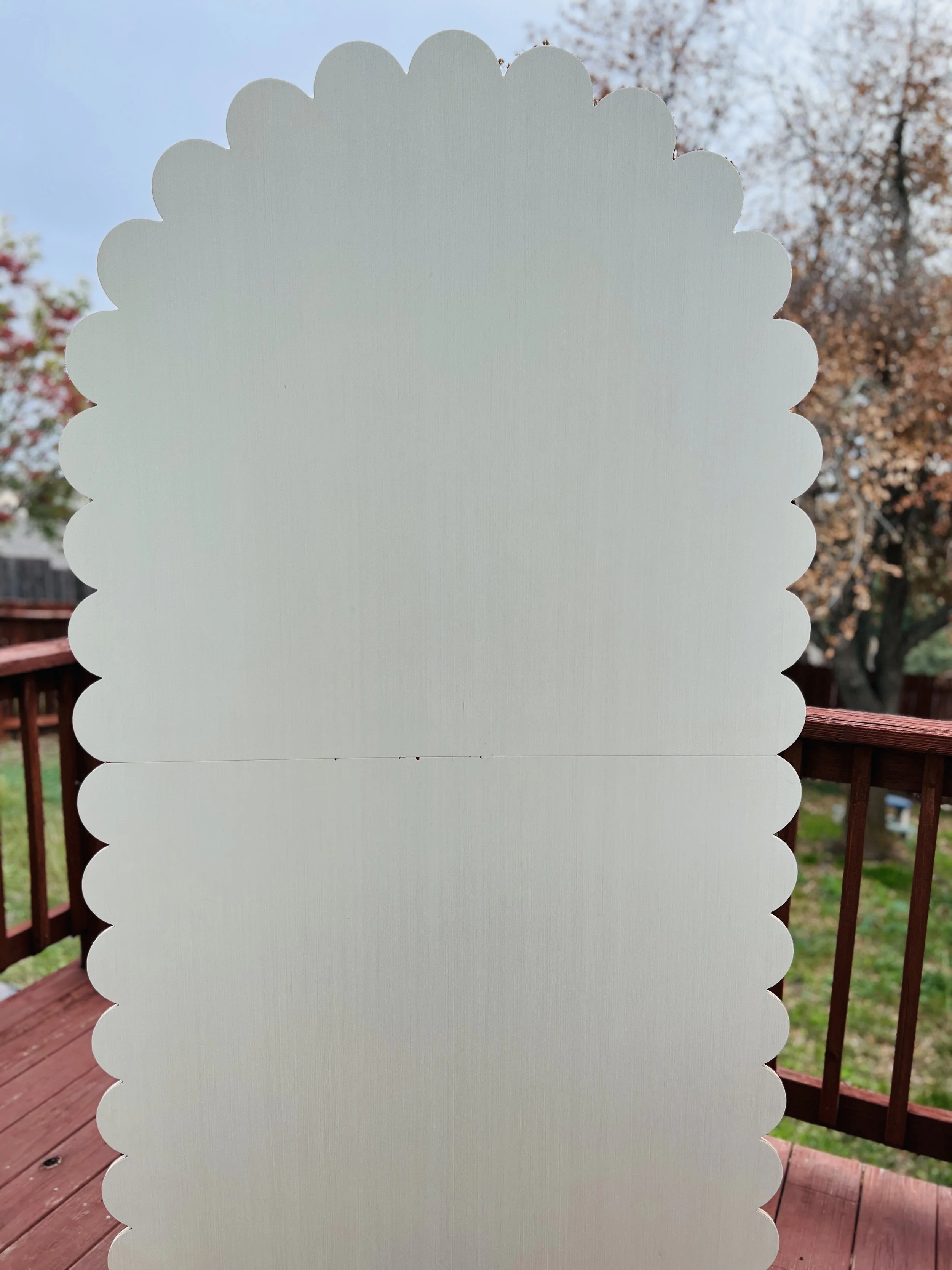 Scalloped wooden arch 