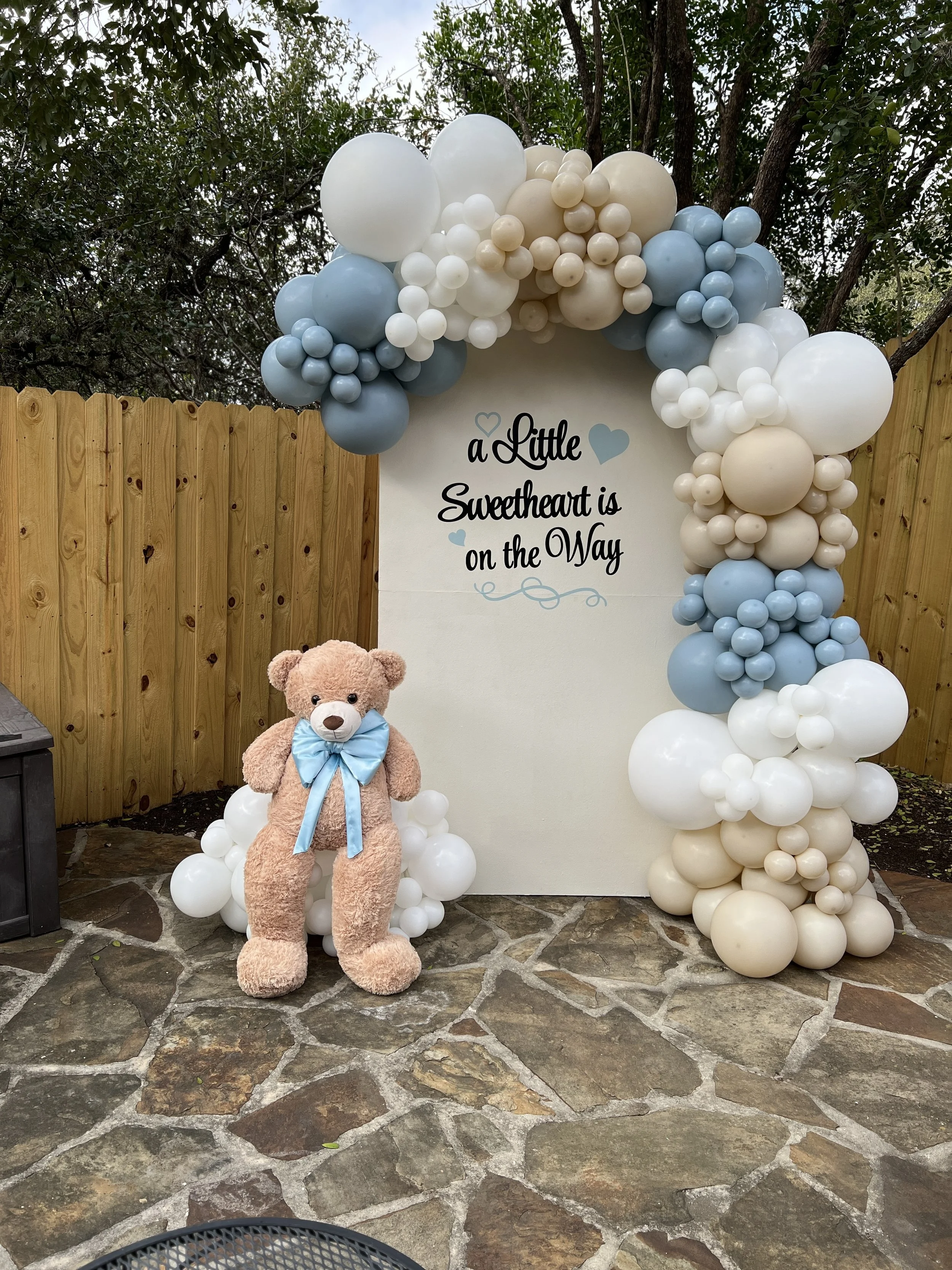 Bear theme baby shower with extra large custom vinyl decal. Jumbo bear with bow tie on a cloud.