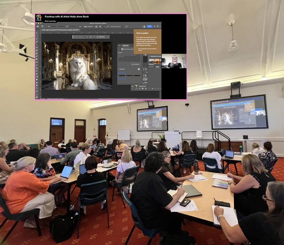 A conference room filled with people sitting at tables, using laptops and taking notes, attending a presentation displayed on two large screens at the front of the room.