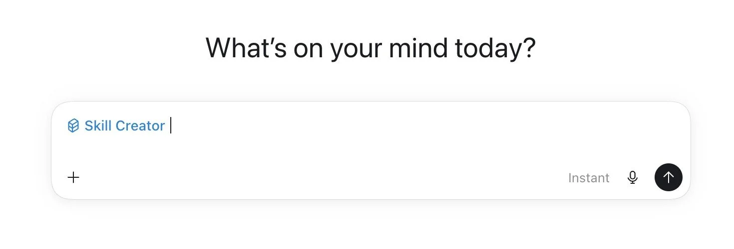 Screenshot of ChatGPT's home screen headed "What's on your mind today?" with the Skill Creator skill attached as a blue chip inside the empty compose bar, next to a plus icon, an Instant label, a microphone icon and a send arrow.