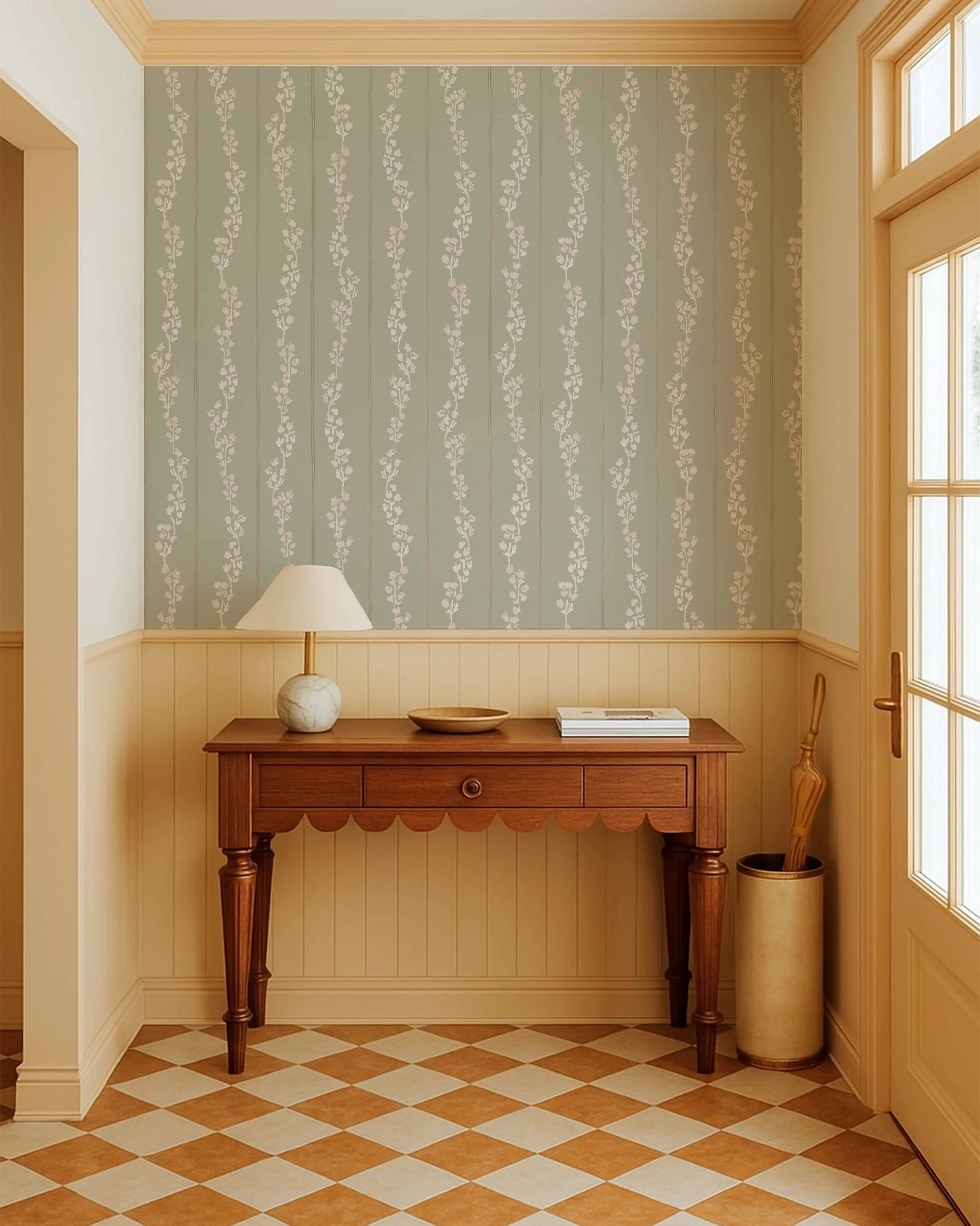 Entryway with yellow walls and large window, wooden table with lamp and decorative bowl, patterned tile floor.