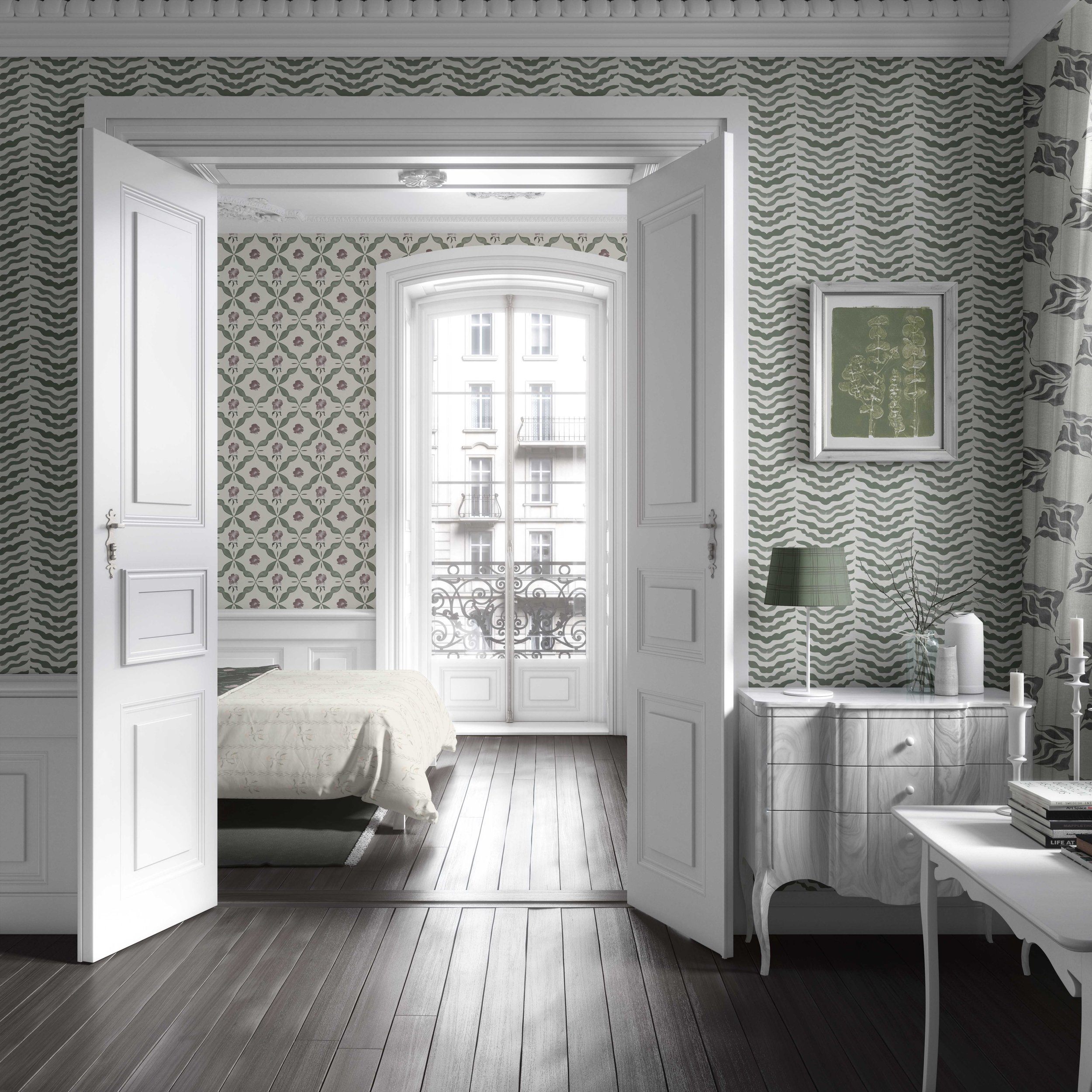 A view through an open white door into a bright room with a high ceiling and a large window, showing a balcony or terrace outside. The walls are decorated with patterned wallpaper, and there is a small table with books and candles on it.