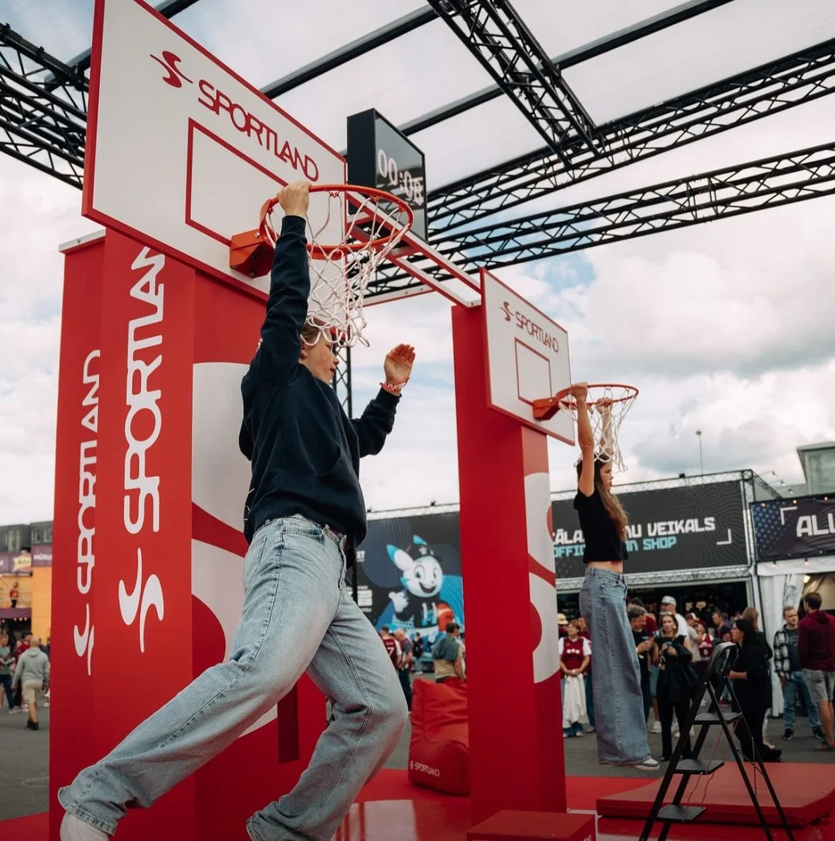 EuroBasket 2025 delivered exceptional partner activations and fan engagement, transforming its fan zones into vibrant, interactive experiences. 
From Sportland’s viral “Hang on the Rim” challenge and Rimi Baltic Group’s energ