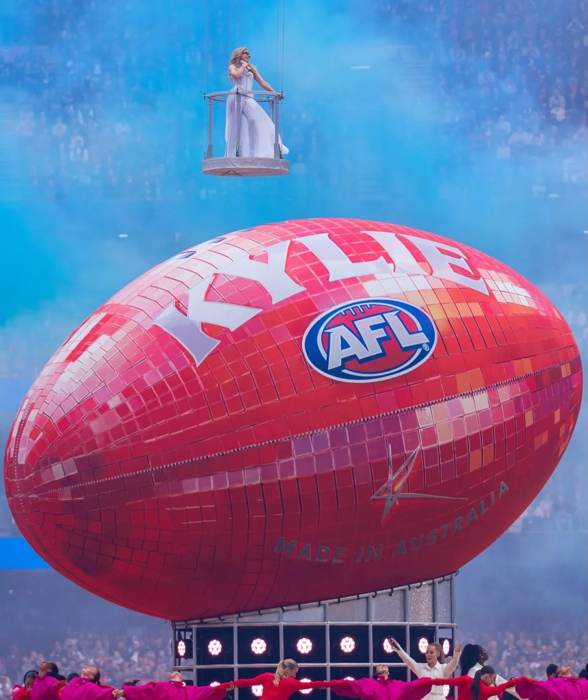 The 2026 AFL Grand Final maximized Kylie Minogue well beyond her headline performance, building &ldquo;Team Kylie&rdquo; into a week-long cultural moment through exclusive merchandise, fan experiences, content and even Kylie-inspired food. 

Footy Fe