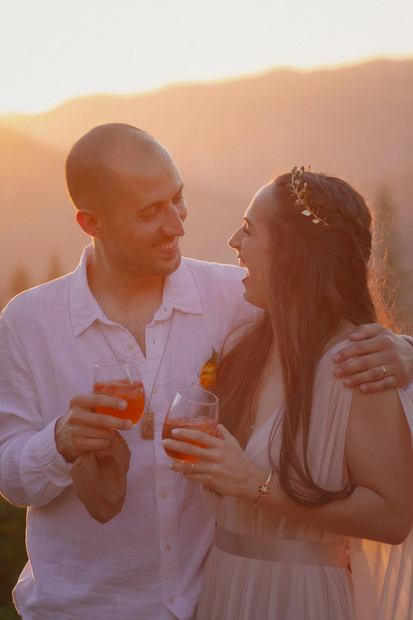 wedding day - the newly weds enjoying the sunset. happy as ever
