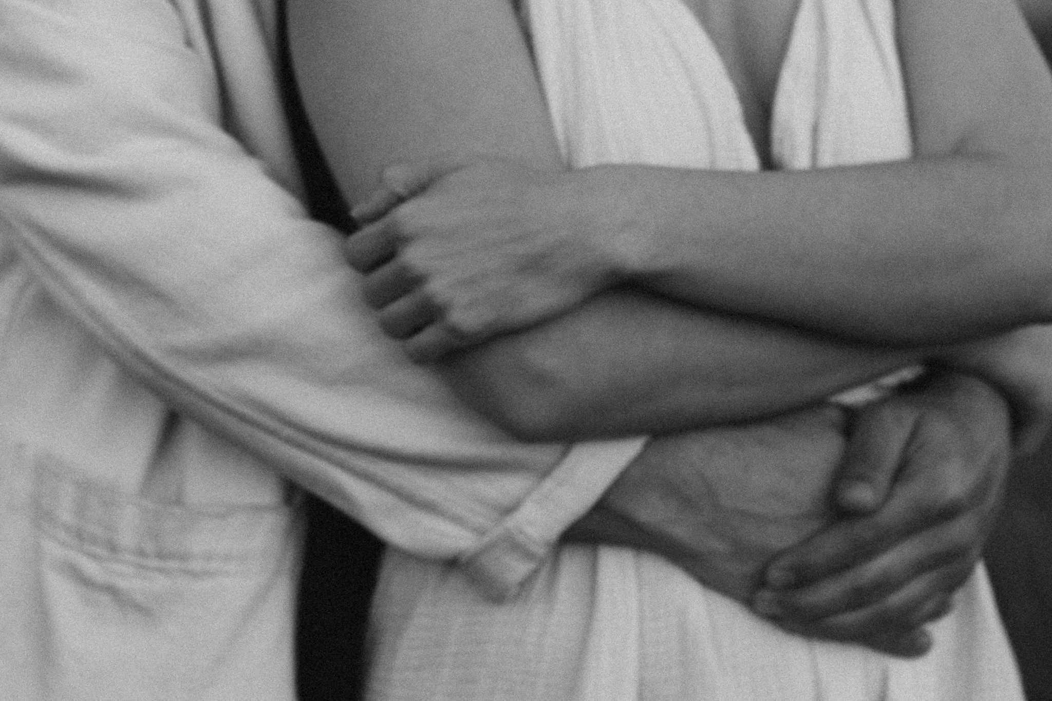 couples photoshoot - A close-up of a couple holding each other