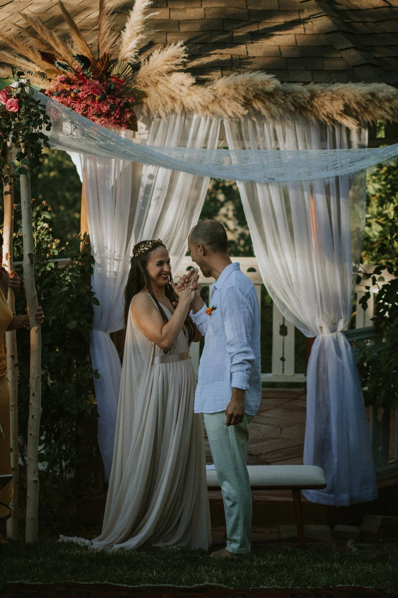wedding day - couple celebrating being married with a handshake