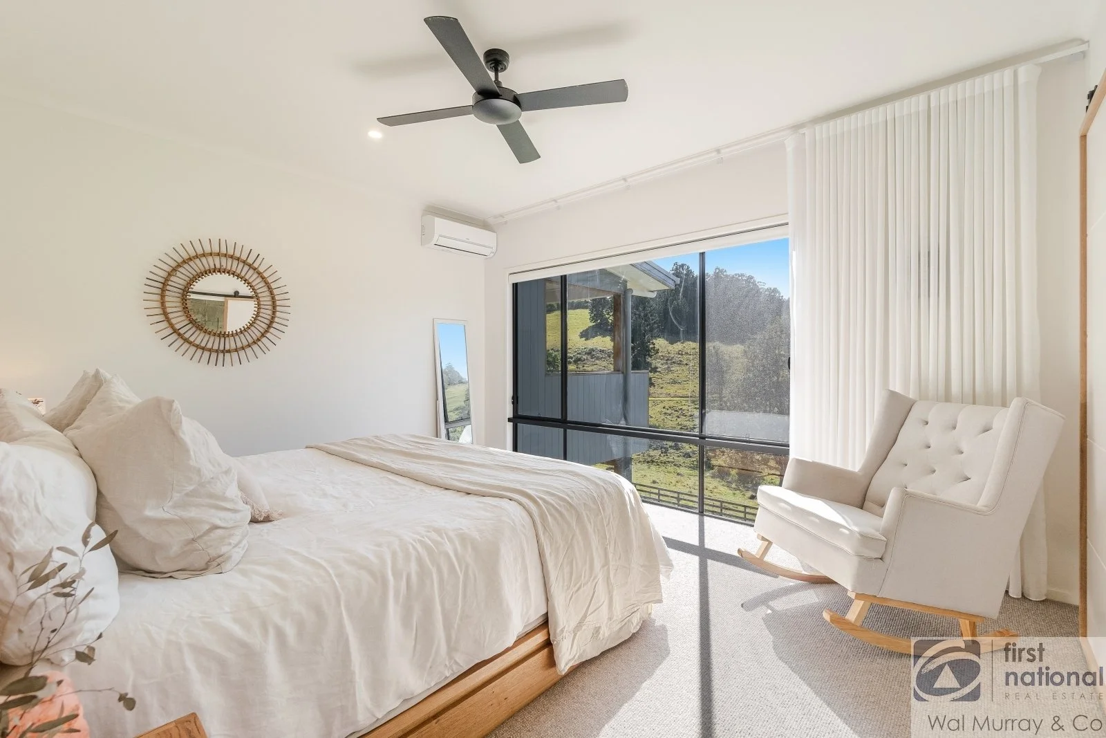 Sawyers master bedroom with black accents
