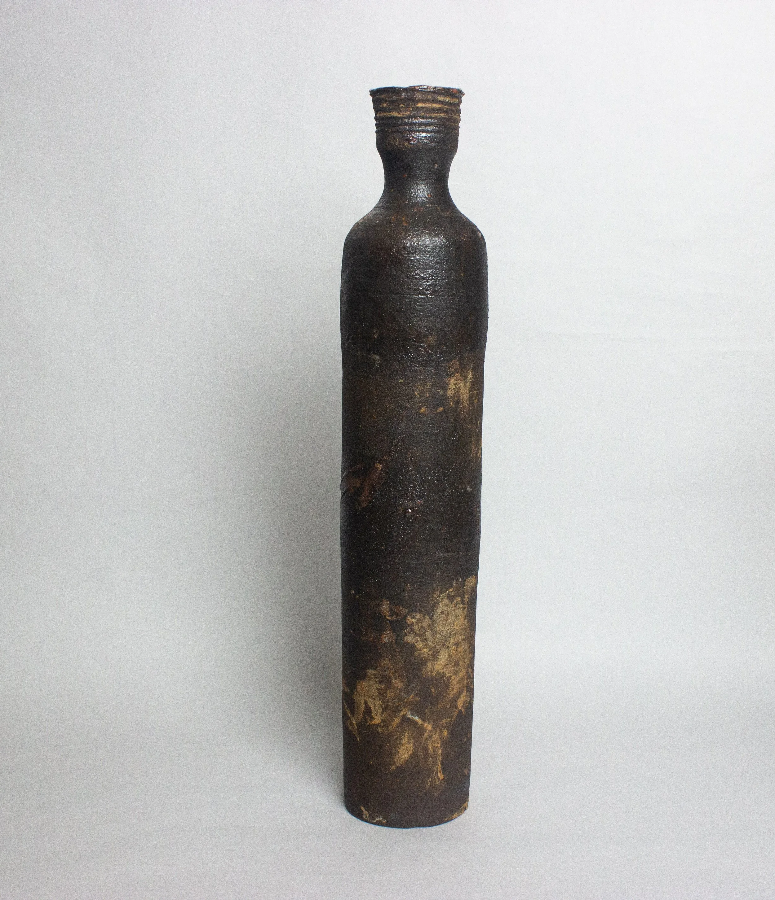 tall dark brown bottle