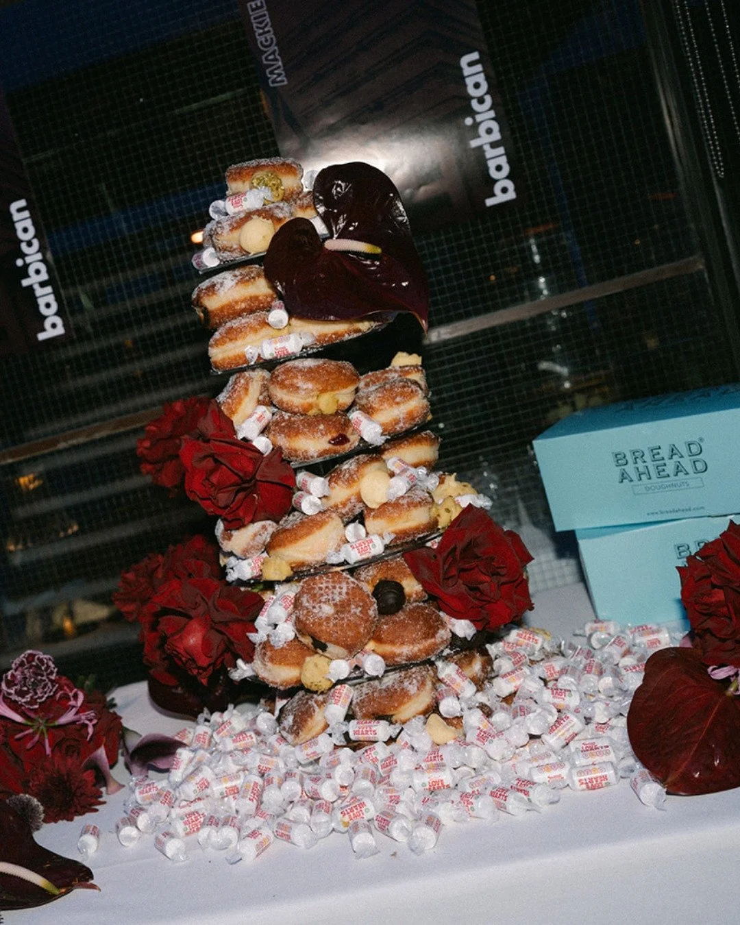 Weddings these days are leaning into fewer traditional formalities and so many more personal touches. 
These babes put together a delicious @breadahead doughnut tower &mdash; and it was an absolute HIT 🍩

Planner | @rebeccavalentinedesign
Venue &amp