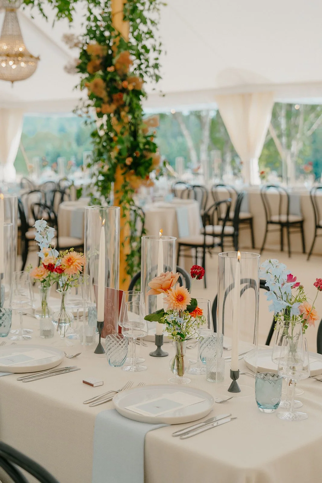 19. tall-wedding-flowers-and-candlelight-marquee.jpg