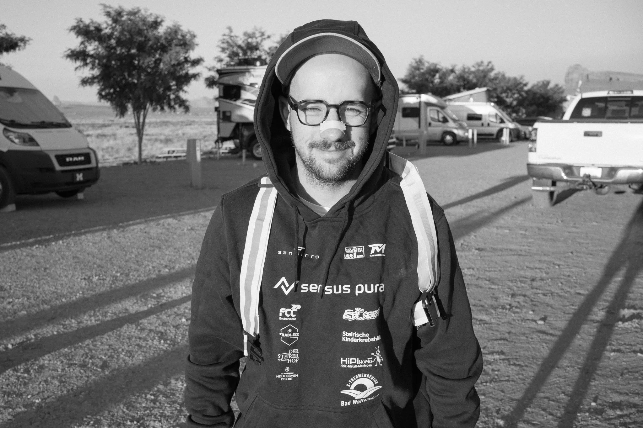 A photographer, pulled from sleep. Camp, before the day begins.