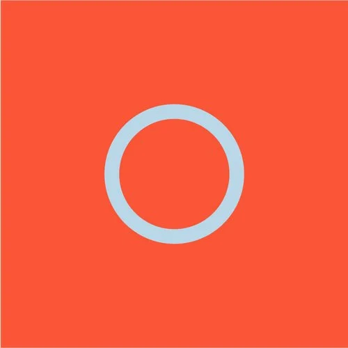 A light blue circle on an orange background.