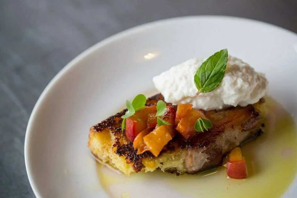 Toast with tomatoes and ricotta and fresh herbs