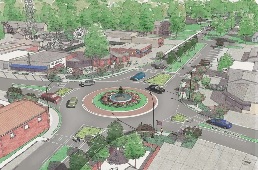 Illustration of a roundabout with cars, surrounding roads, and buildings