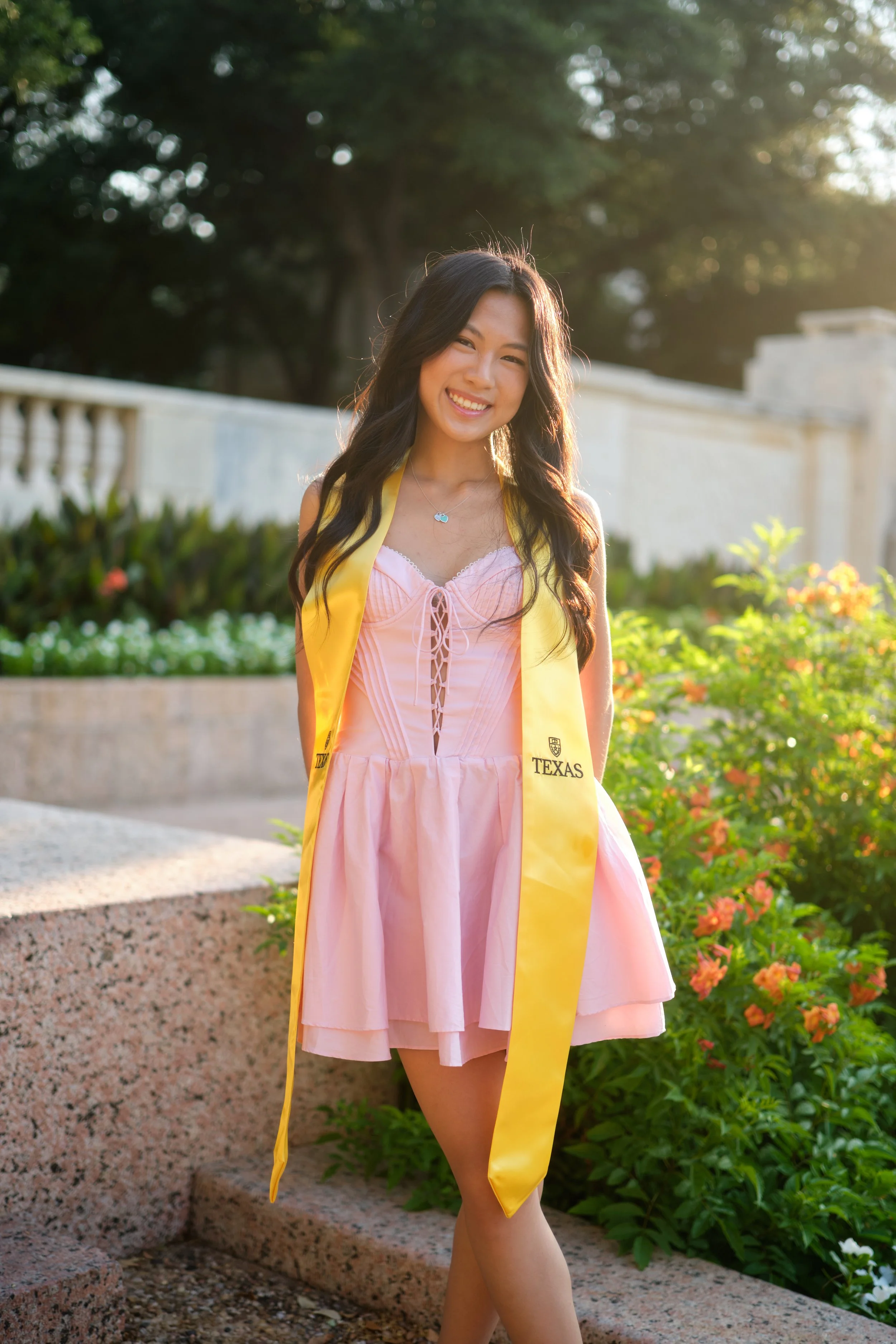 Creative graduation poses at UT Austin – Stand out with unique shots that highlight your journey.