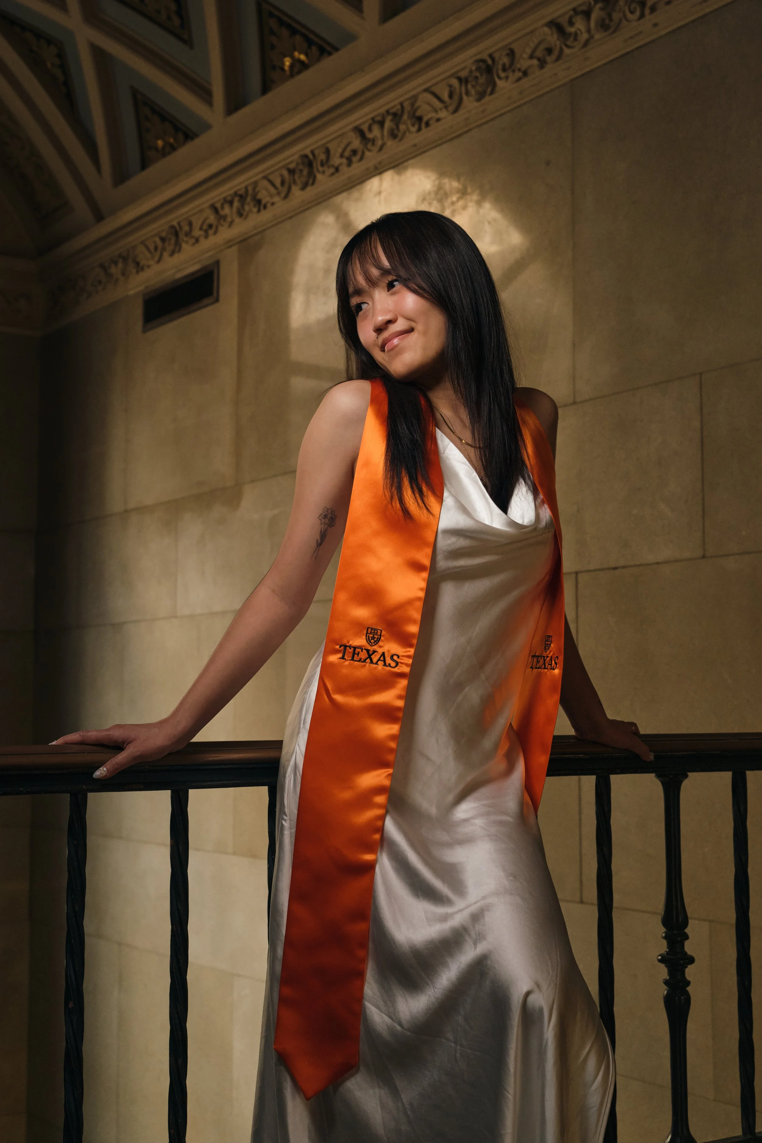UT Austin grad photos with a moody, artistic edit – Depth, drama, brilliance.