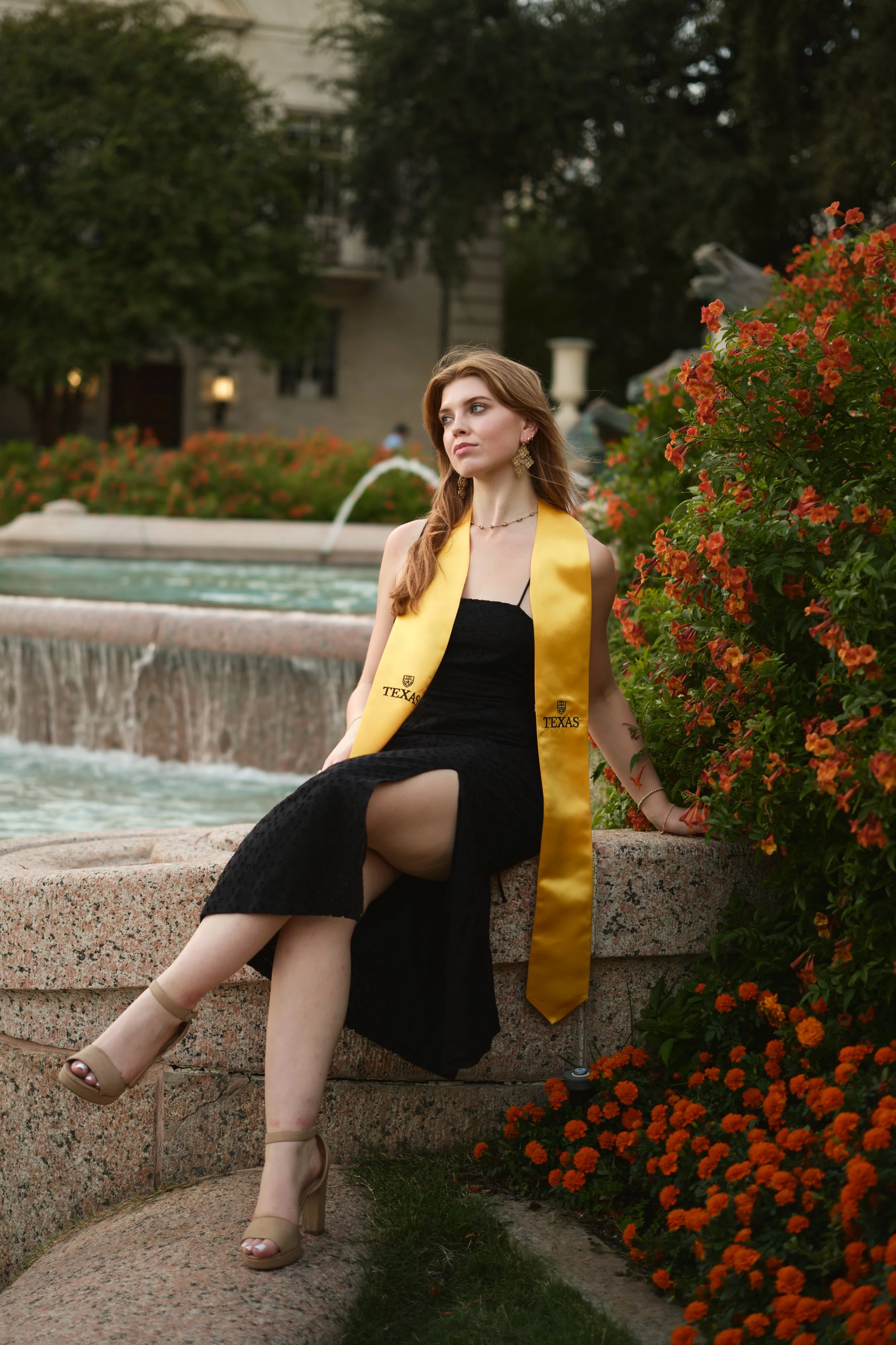 Film-inspired grad photos at the UT Tower – Where classic meets modern artistry.