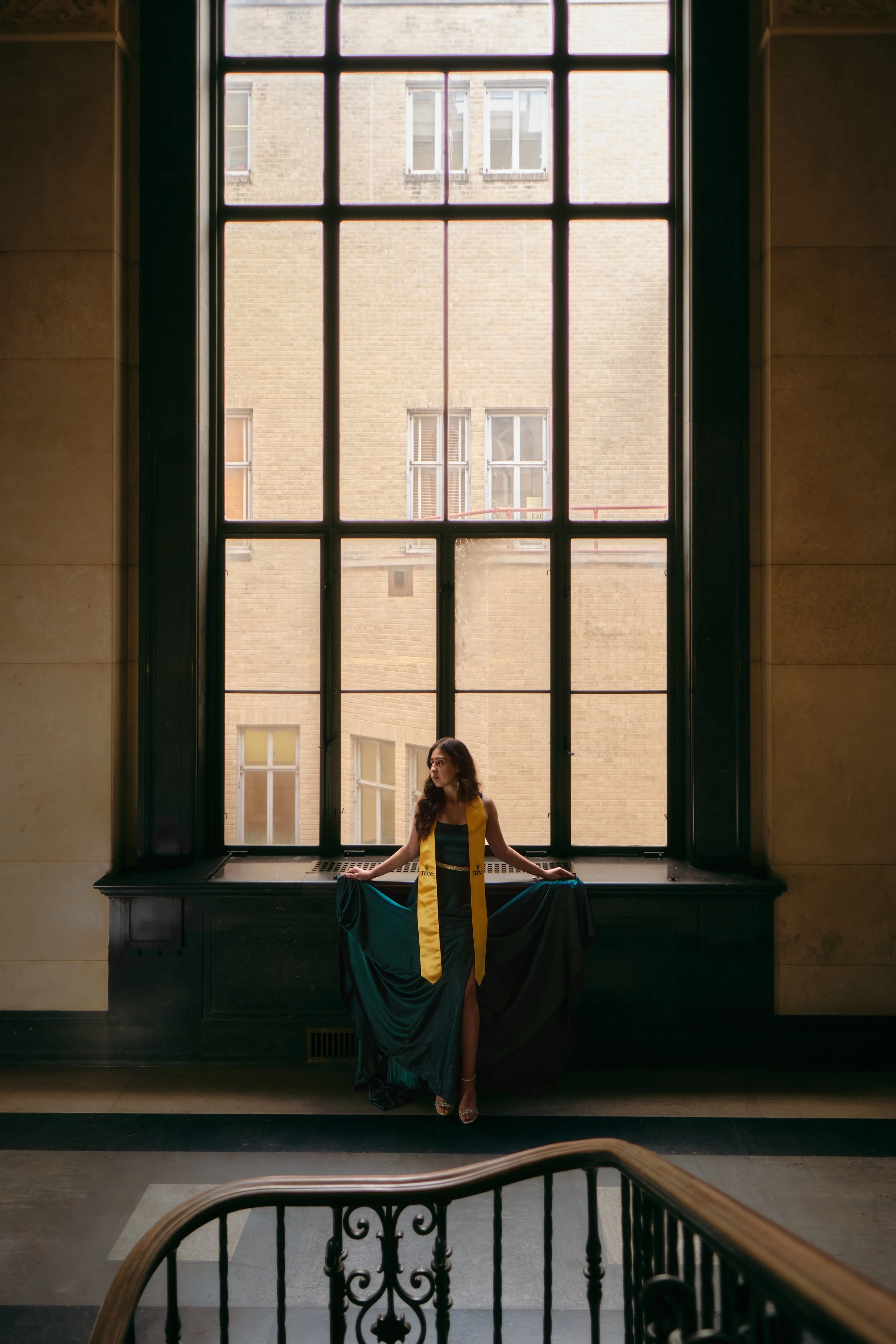 UT Austin grad photos with a moody, cinematic edit – Dramatic. Bold. Unforgettable.
