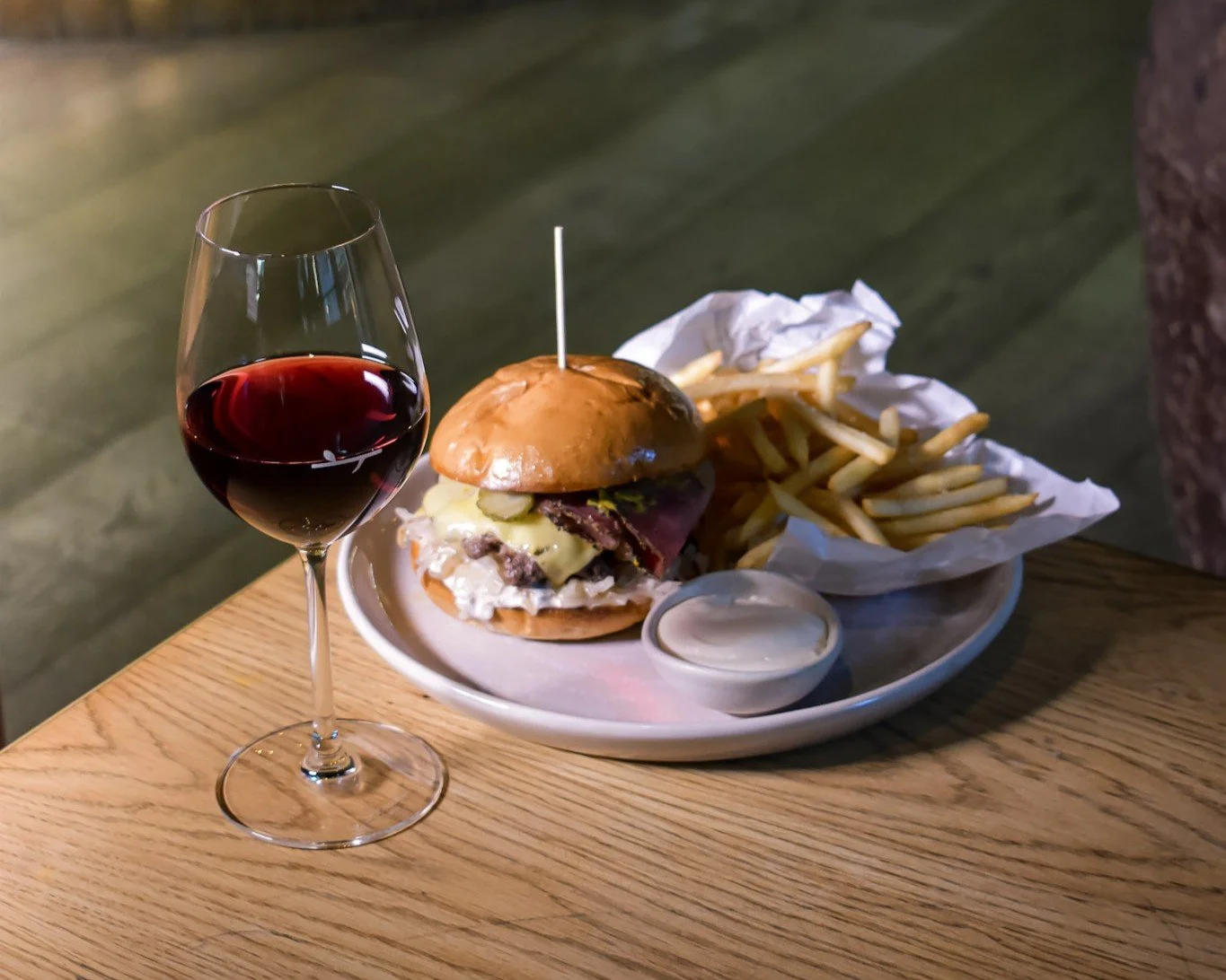 Burger, fries and red wine served for lunch at The Glass Goose