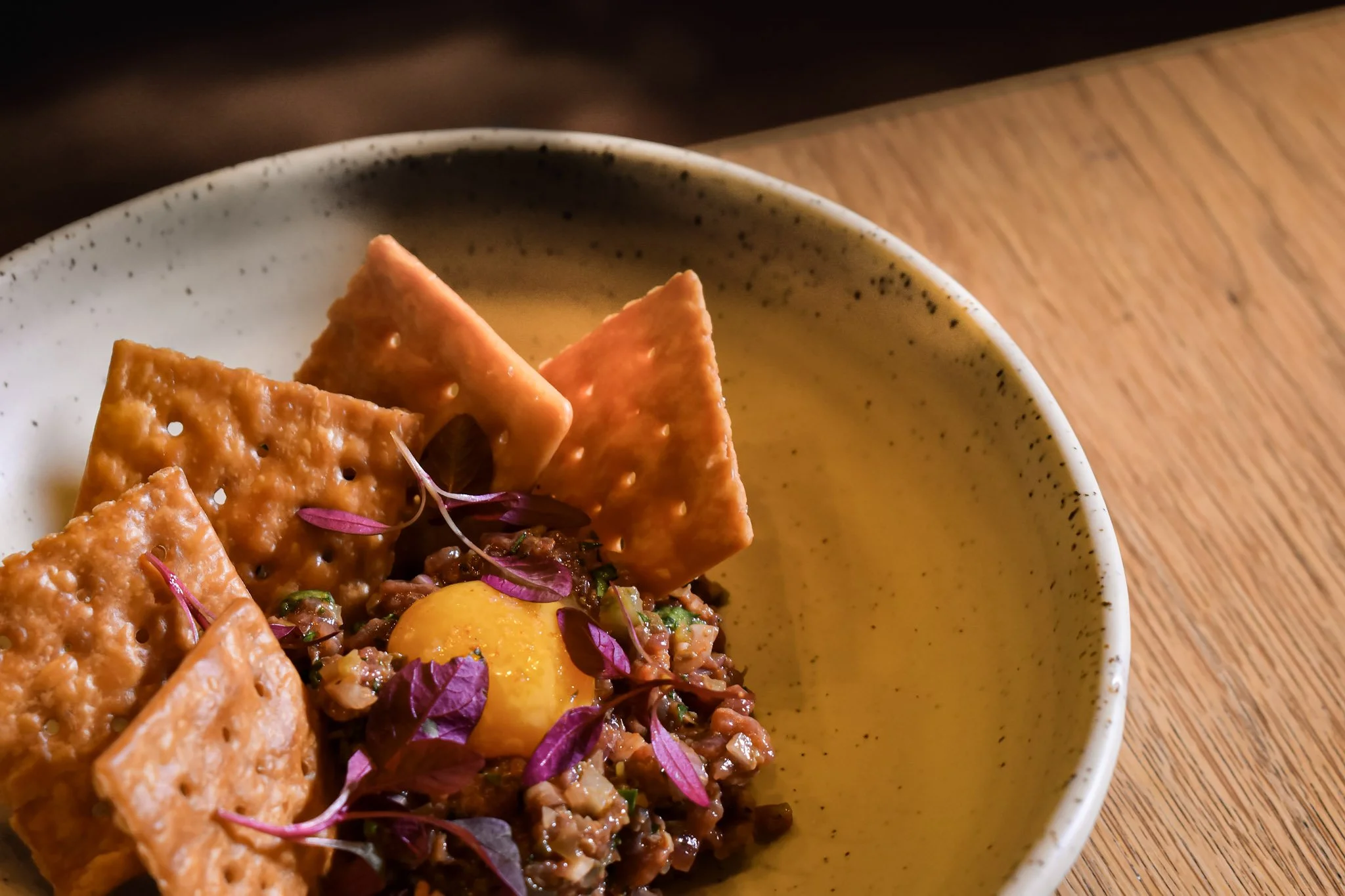 Steak tartare with fried Salada crackers and egg yolk at The Glass Goose