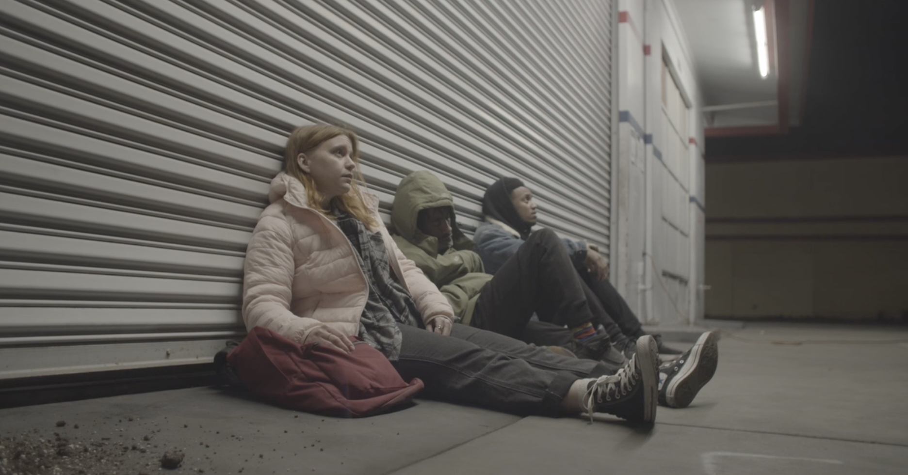 Kimberly Weinberger as Kelsey with Jordan Covington as Oscar and Evan-Joelle as John
