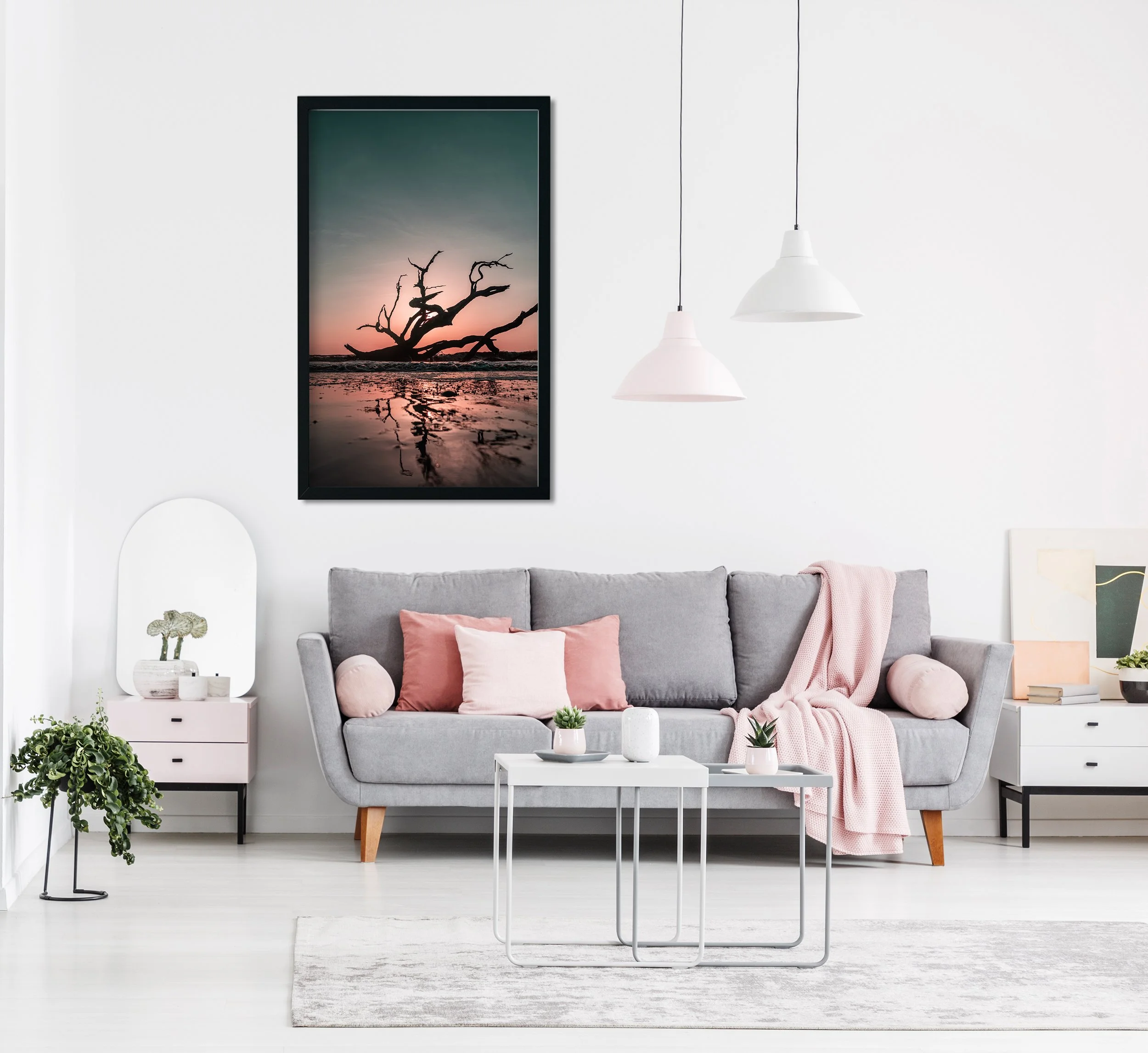 Lamps above table in white spacious living room interior with gr