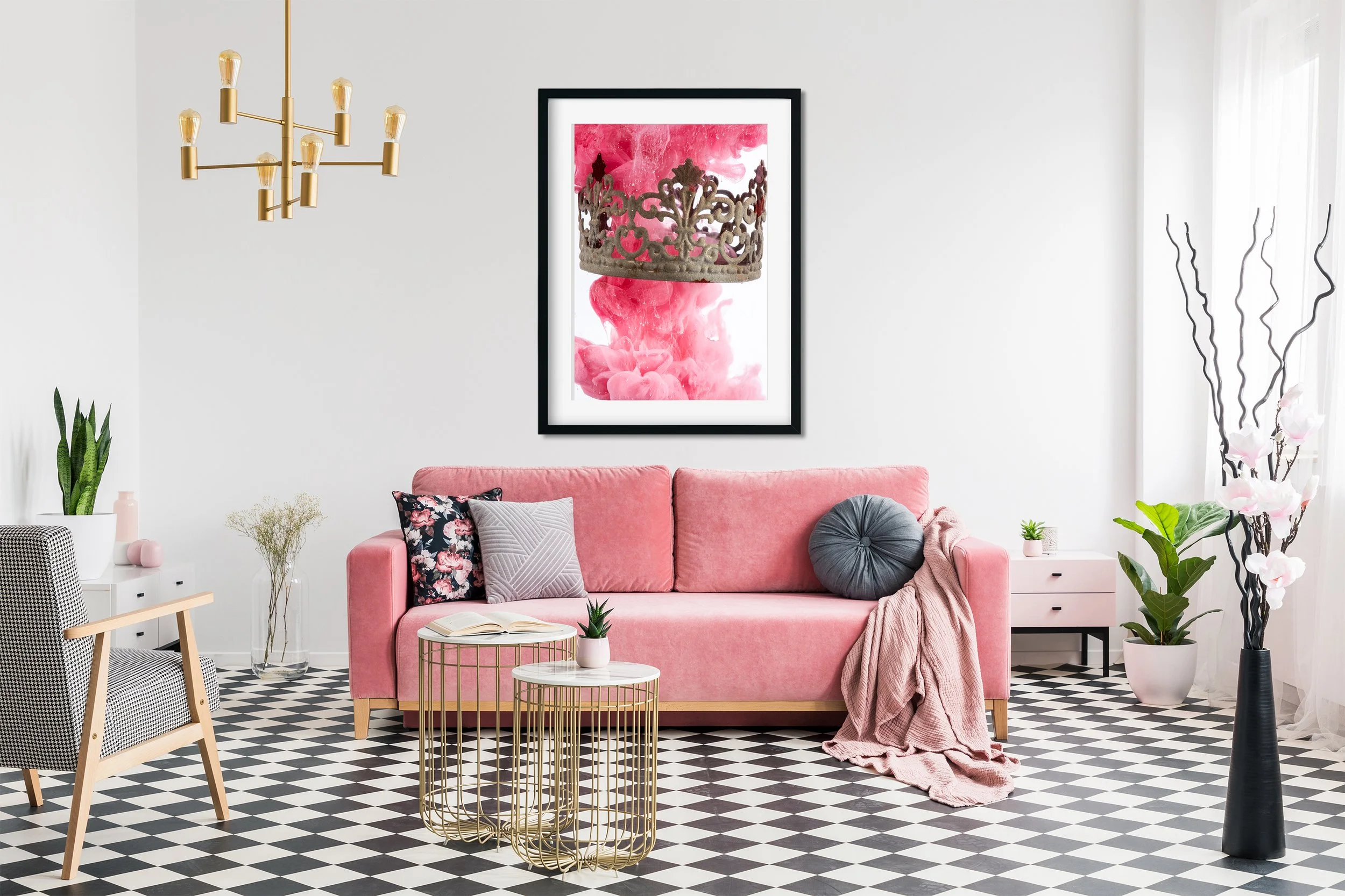 Patterned armchair near gold tables and pink sofa in white flat 