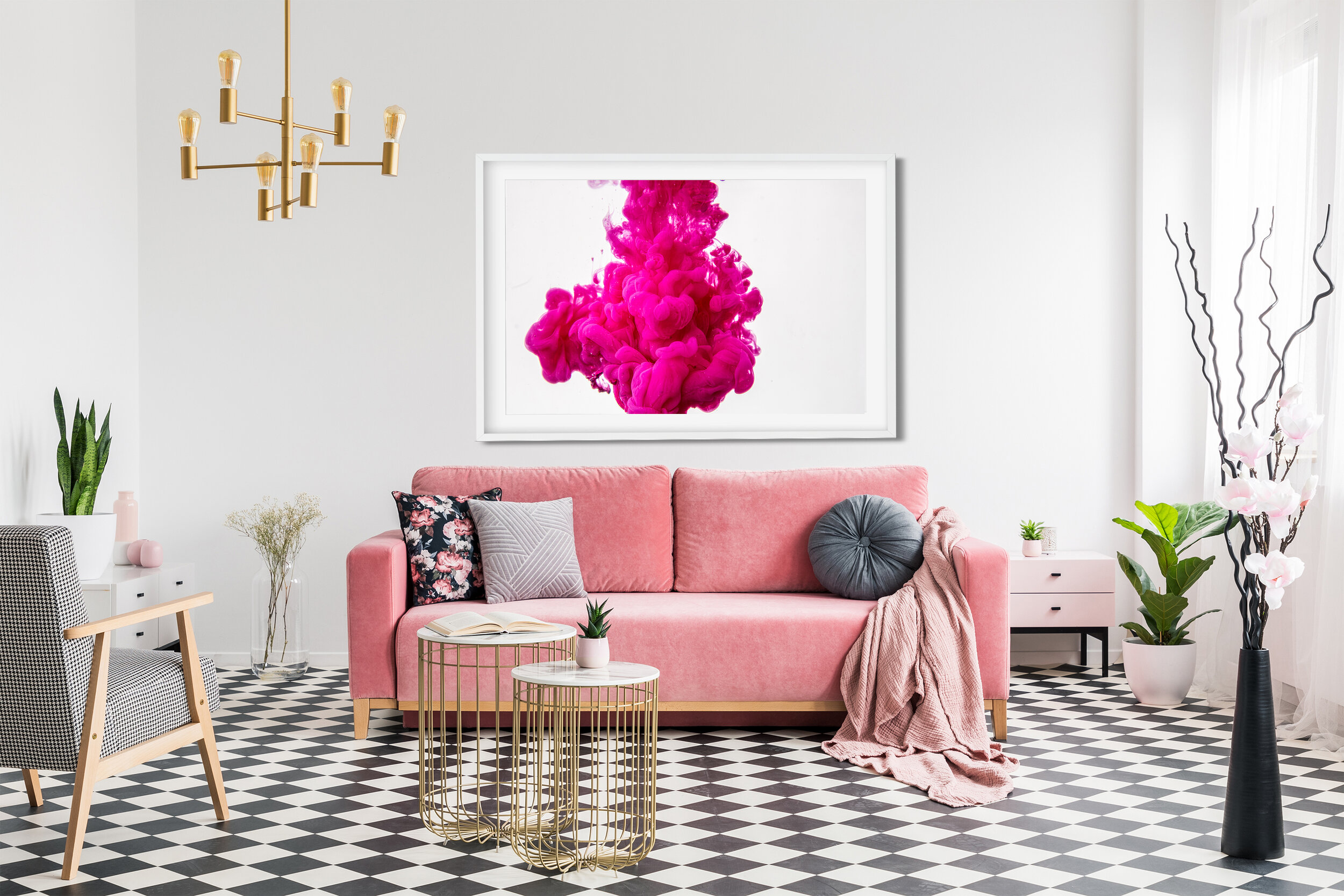 Patterned armchair near gold tables and pink sofa in white flat 