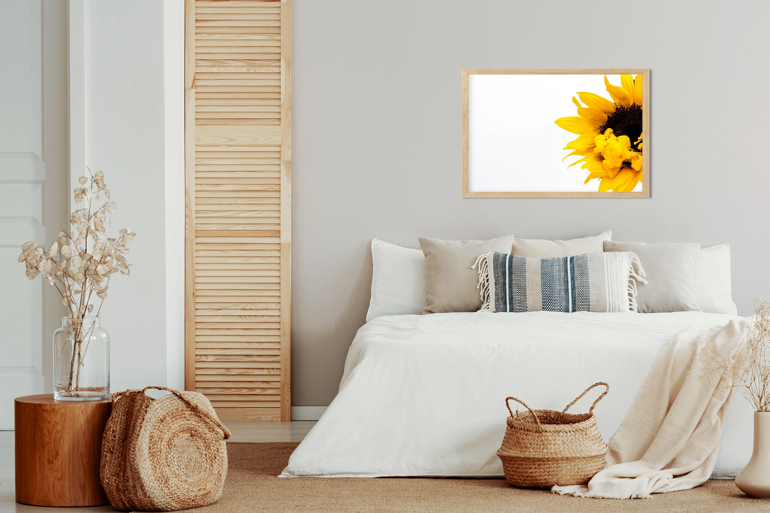 Copy space on white empty wall of natural bright bedroom with na