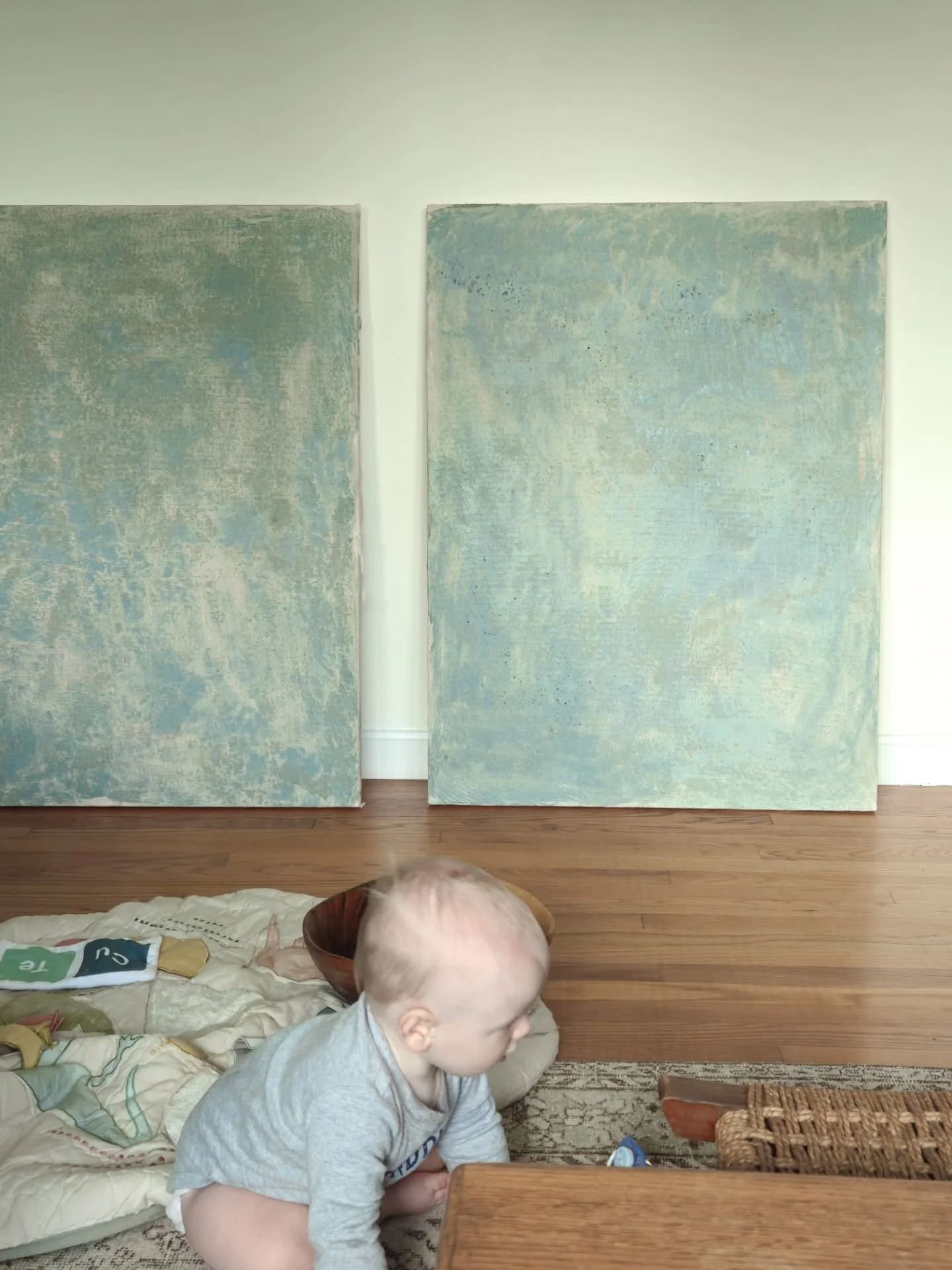 Newly crawling baby over here. I have my hands full now!

Pictured are two 30&quot;x40 paintings with a beautiful blue base layer. I was craving an earthy green/blue color on these. Now, it's time to layer on more neutrals and browns. Can't wait to s