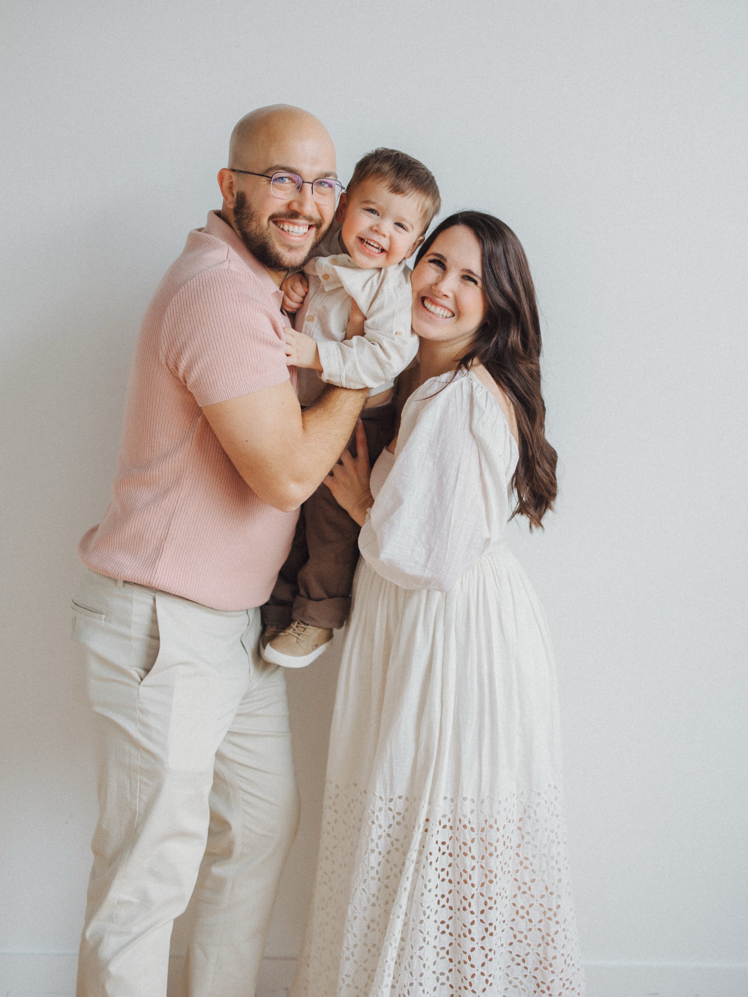 I love shooting outside as much as possible, but there&rsquo;s also something about a sweet family session in the studio that feels so raw. It strips away the distractions and just focuses on the family, the emotions, the little details that you want