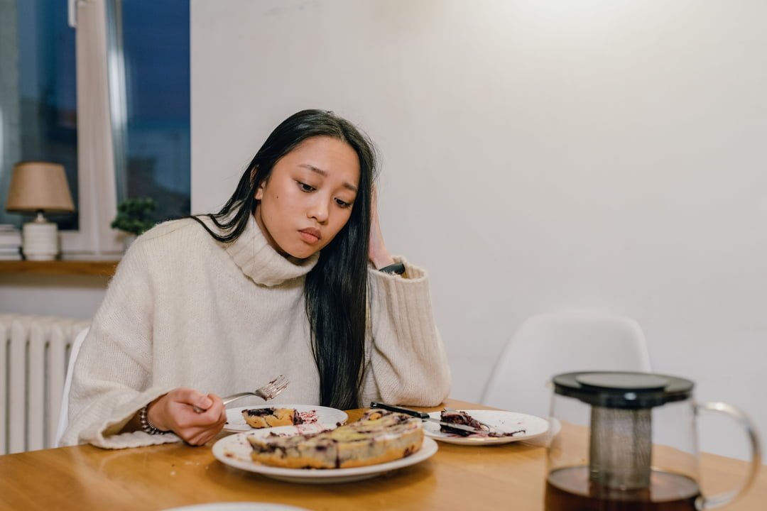 a woman eating desert