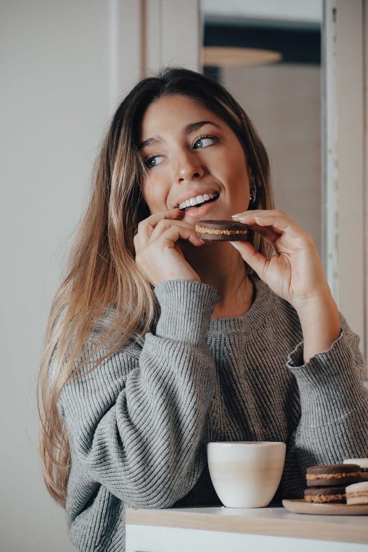 woman eating a cookie