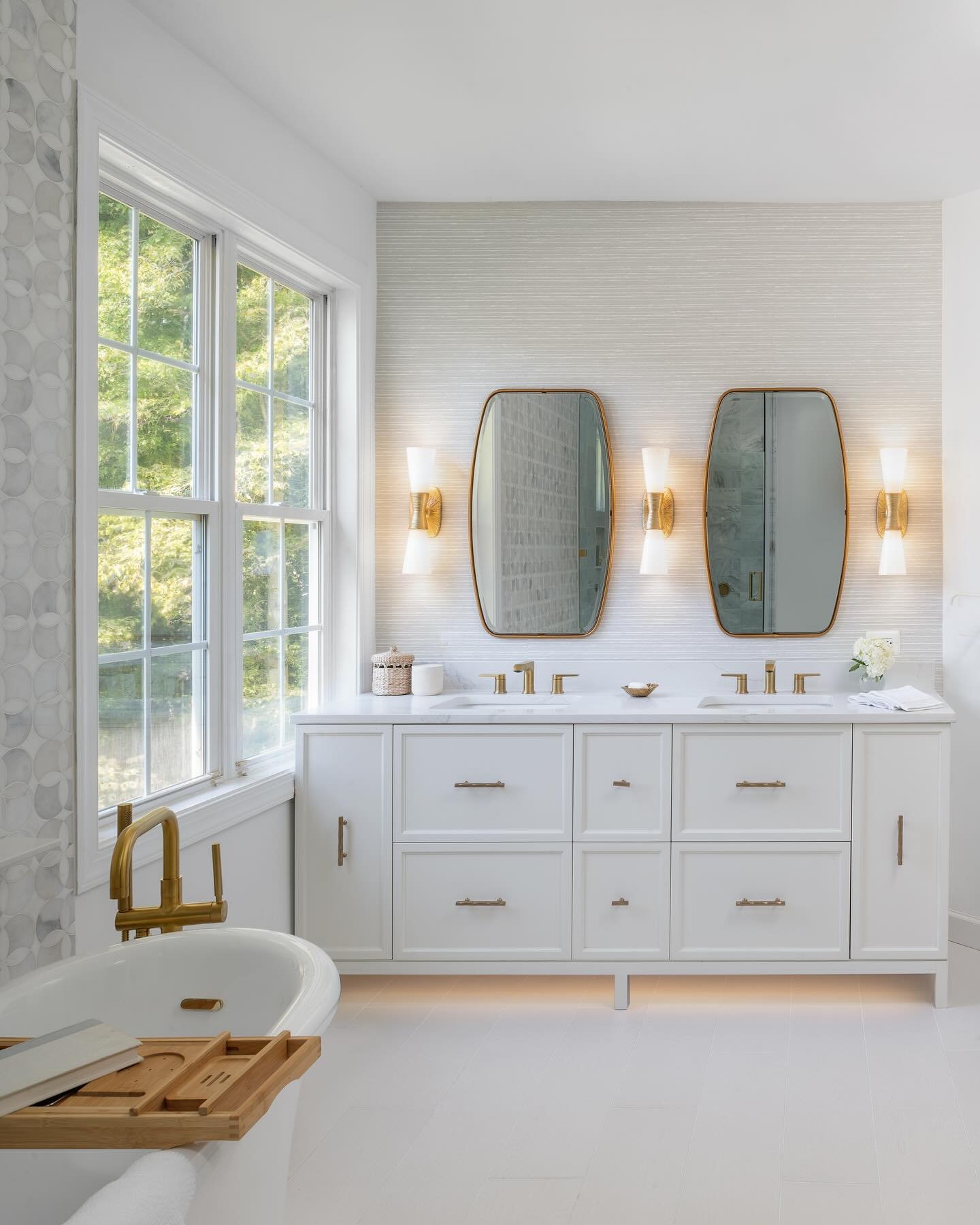 Serenity, reimagined.✨
To bring our clients&rsquo; dream of a spa-like retreat to life, we reimagined the entire layout&mdash;relocating the vanities, shower, and water closet to maximize flow and function. A glass-enclosed shower with luxe spa featu