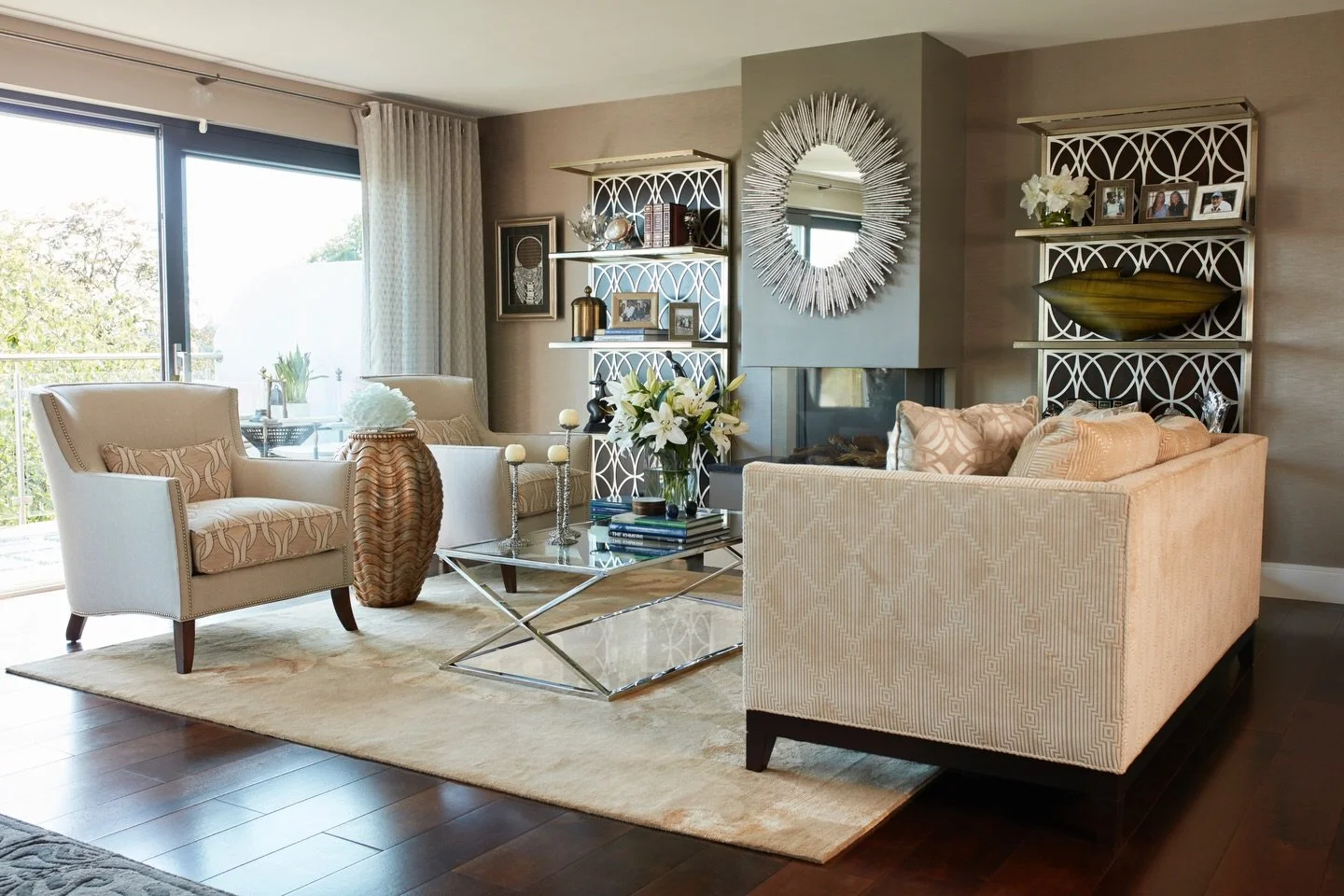 In this living room, layered neutrals, thoughtful symmetry, and reflective textures create a space that feels calm, collected, and quietly luxurious. Every element balances warmth, light, and comfort.✨

#lornagross #lornagrossinteriordesign #homedesi